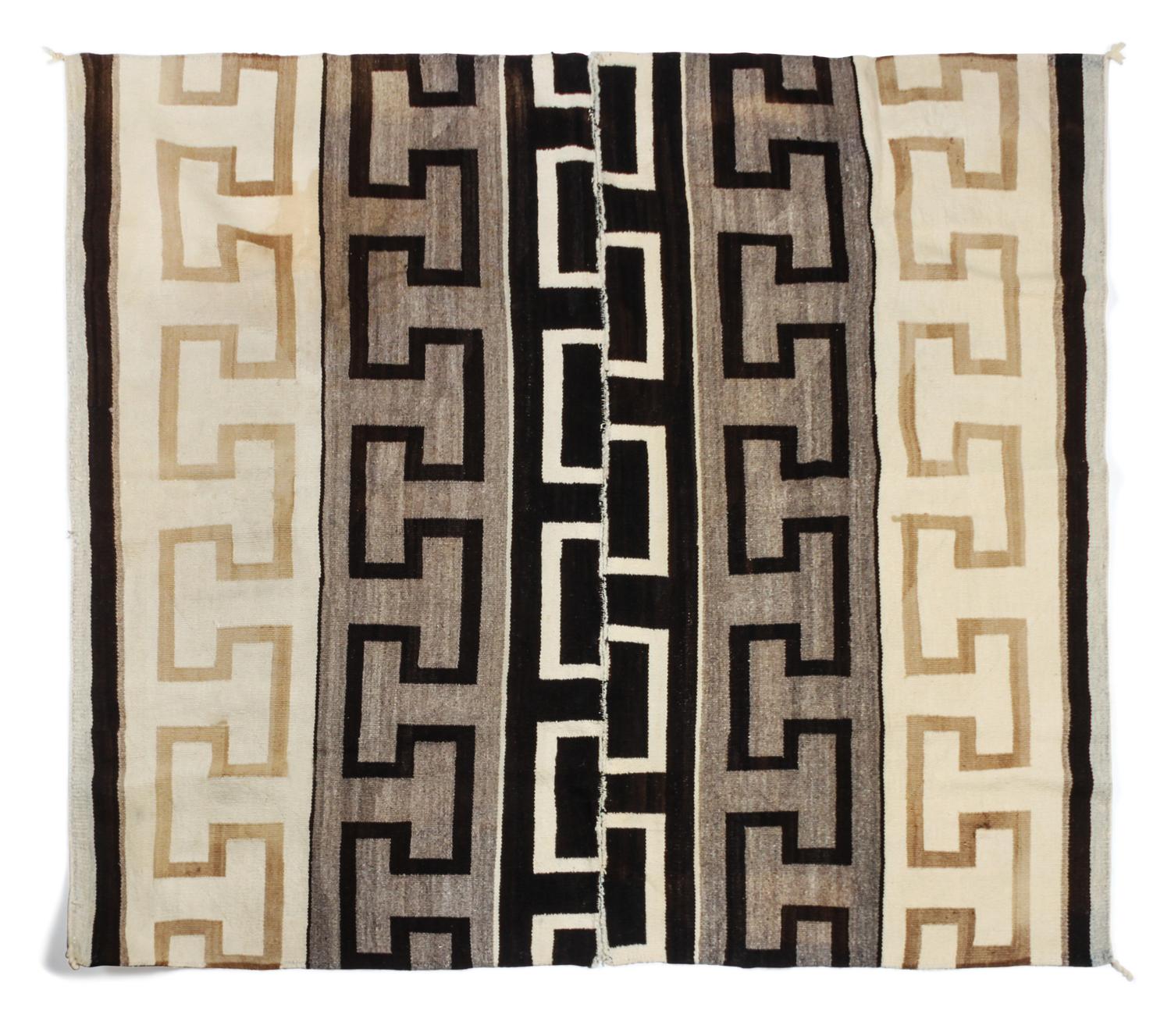 A Navajo Ganado Rug First: 107 1/2 x 45 1/2 inches. — CIRCA 1920