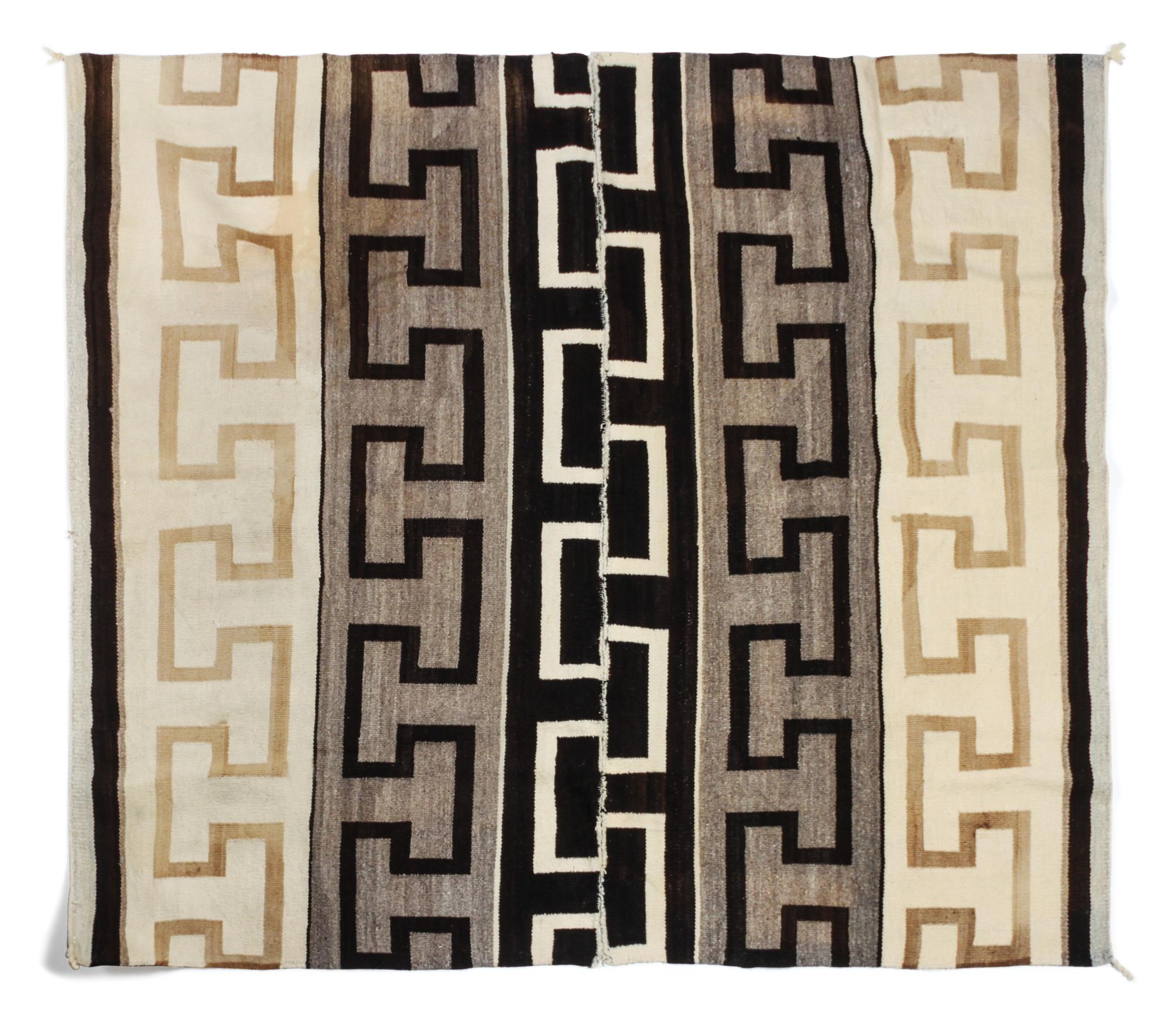 A Navajo Ganado Rug First: 107 1/2 x 45 1/2 inches. — CIRCA 1920