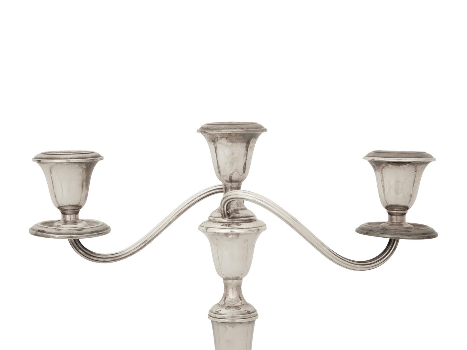 A Pair of American Silver Candlesticks and an American Silver Three Light Candelabrum