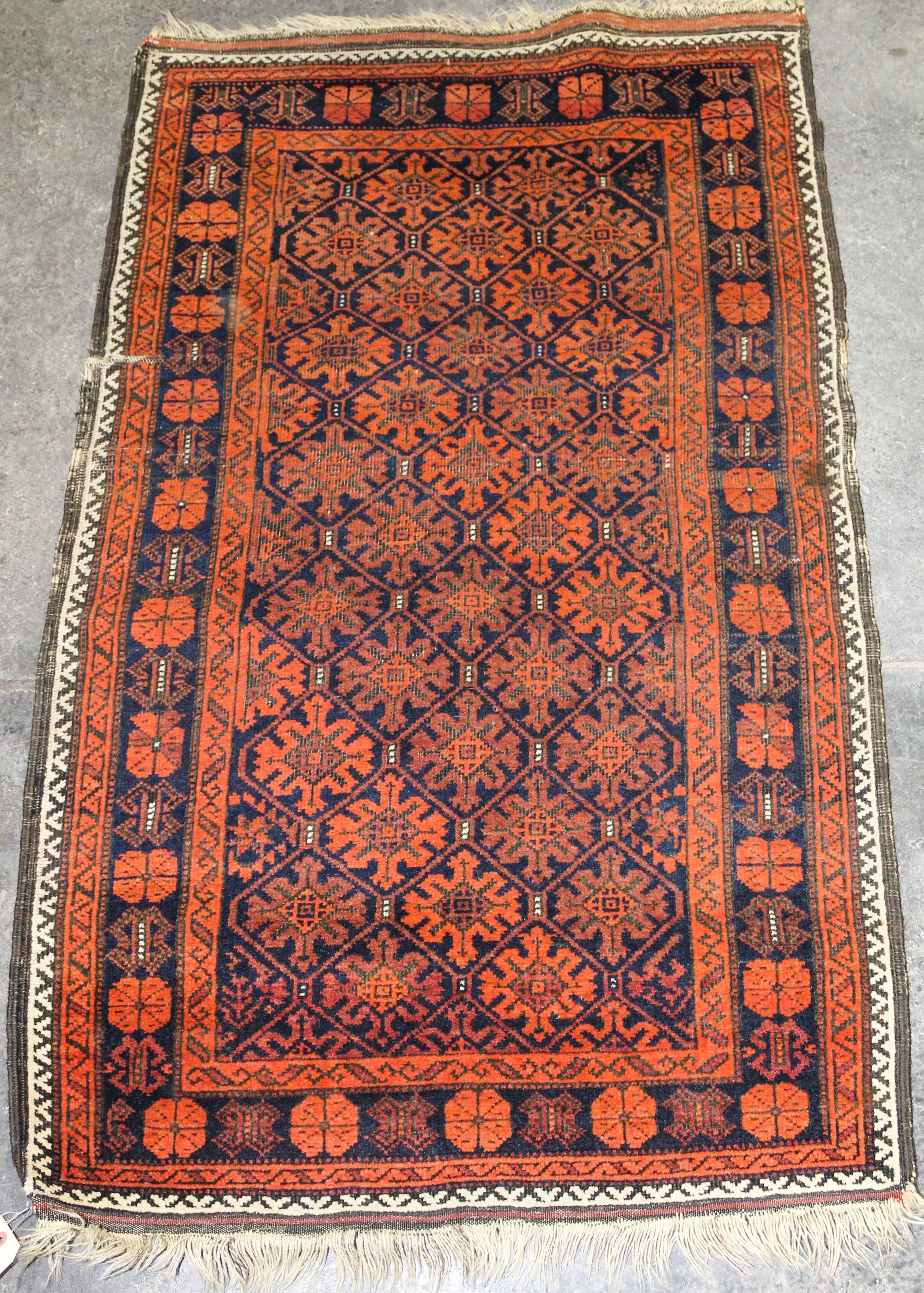 A Caucasian Wool Rug 4 feet 4 inches x 2 feet 8 inches. — EARLY 20TH CENTURY