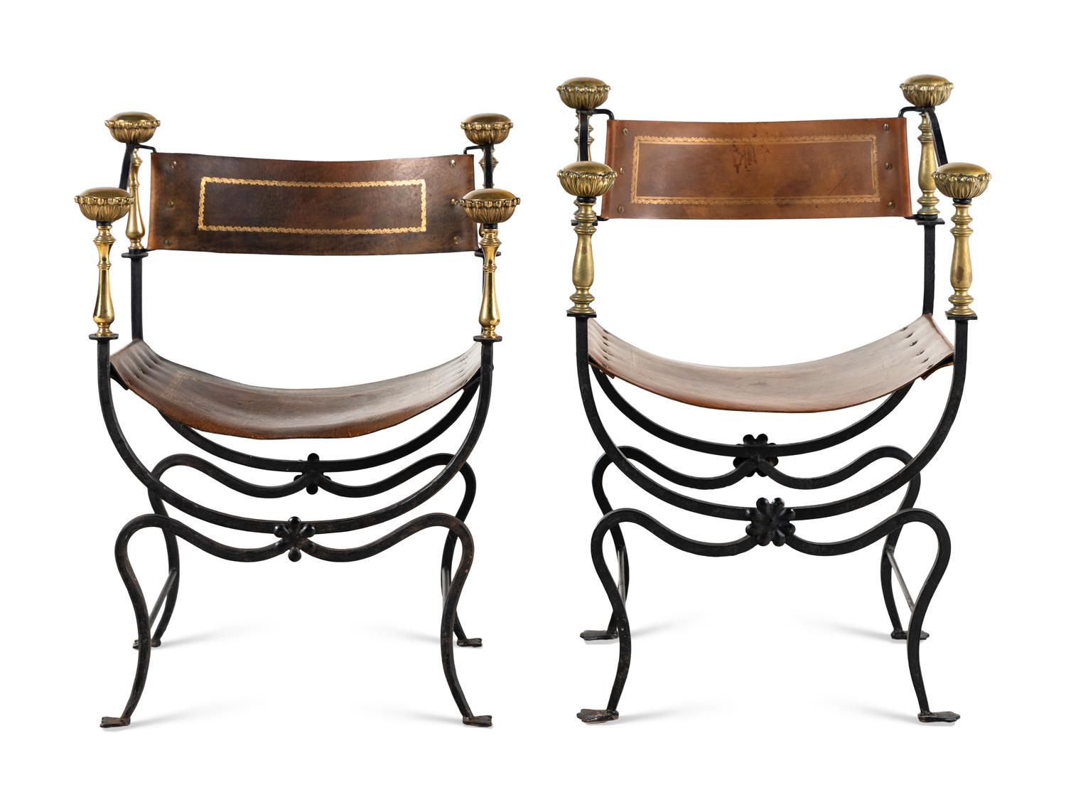 A Near Pair of Continental Iron and Brass Curule Armchairs
