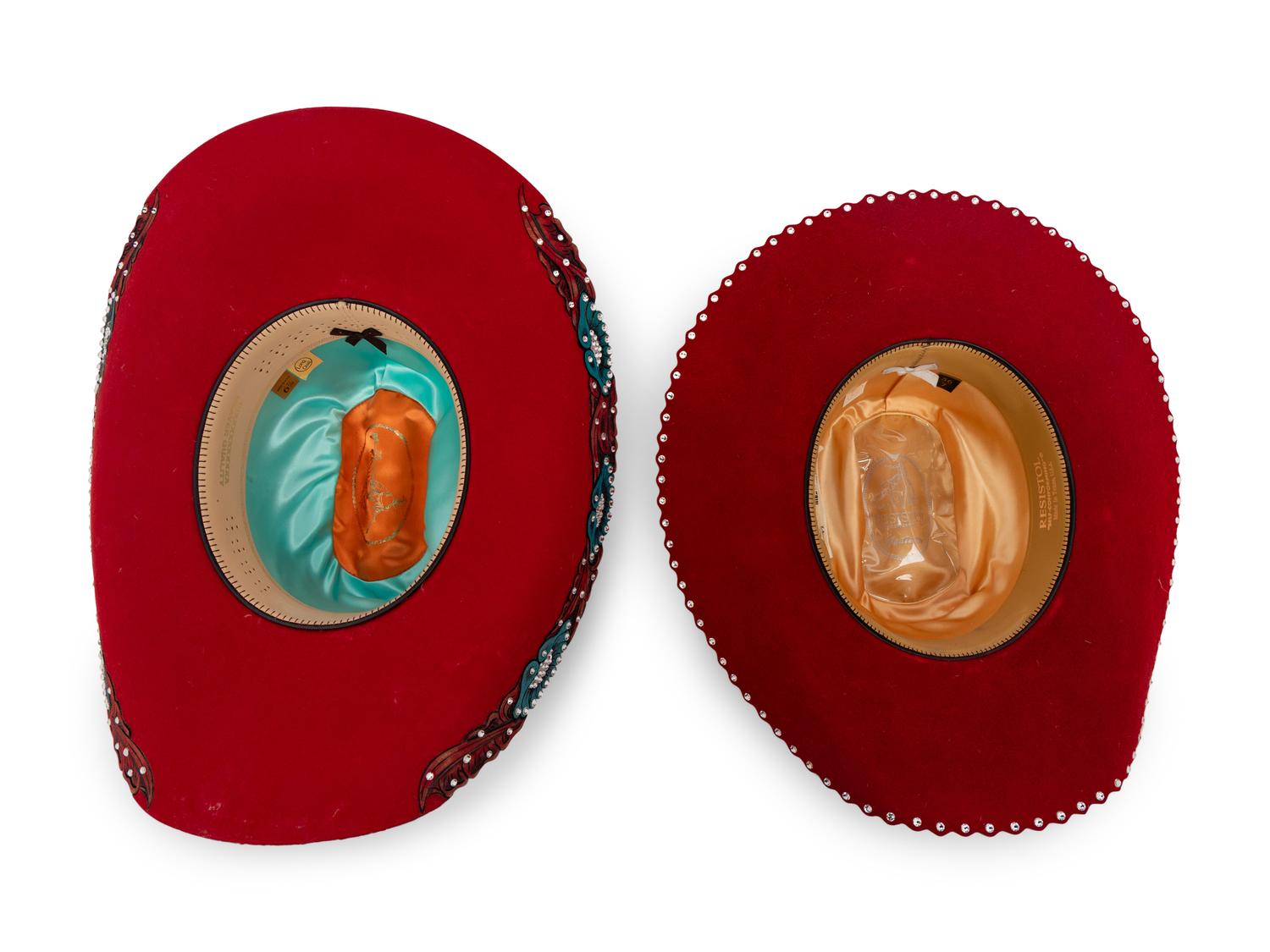 Two Red Western Hats and Hat Case
