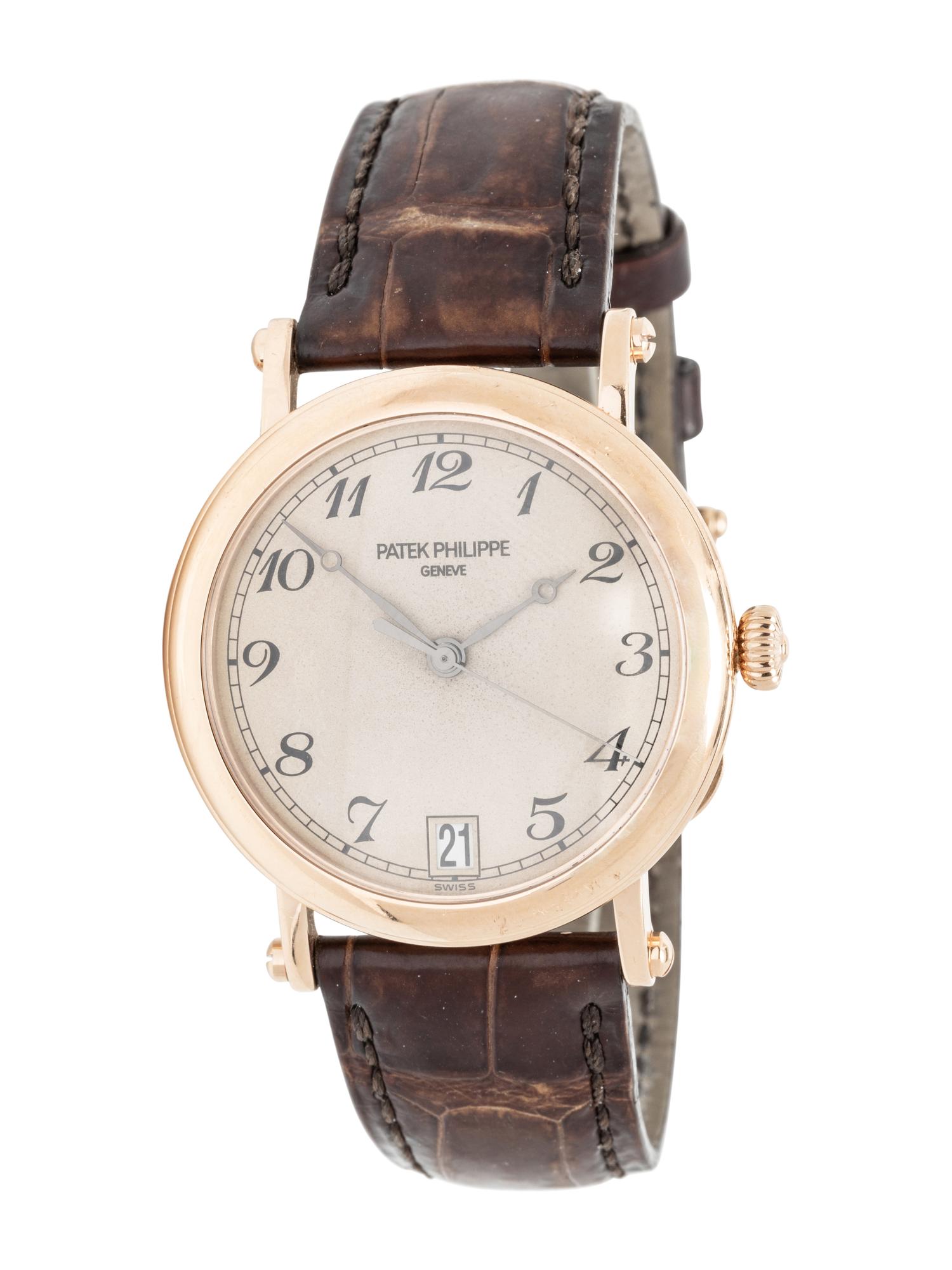 PATEK PHILIPPE, REF. 5053 18K YELLOW GOLD 'CALATRAVA' DATE WATCH WITH OFFICER'S CASEBACK