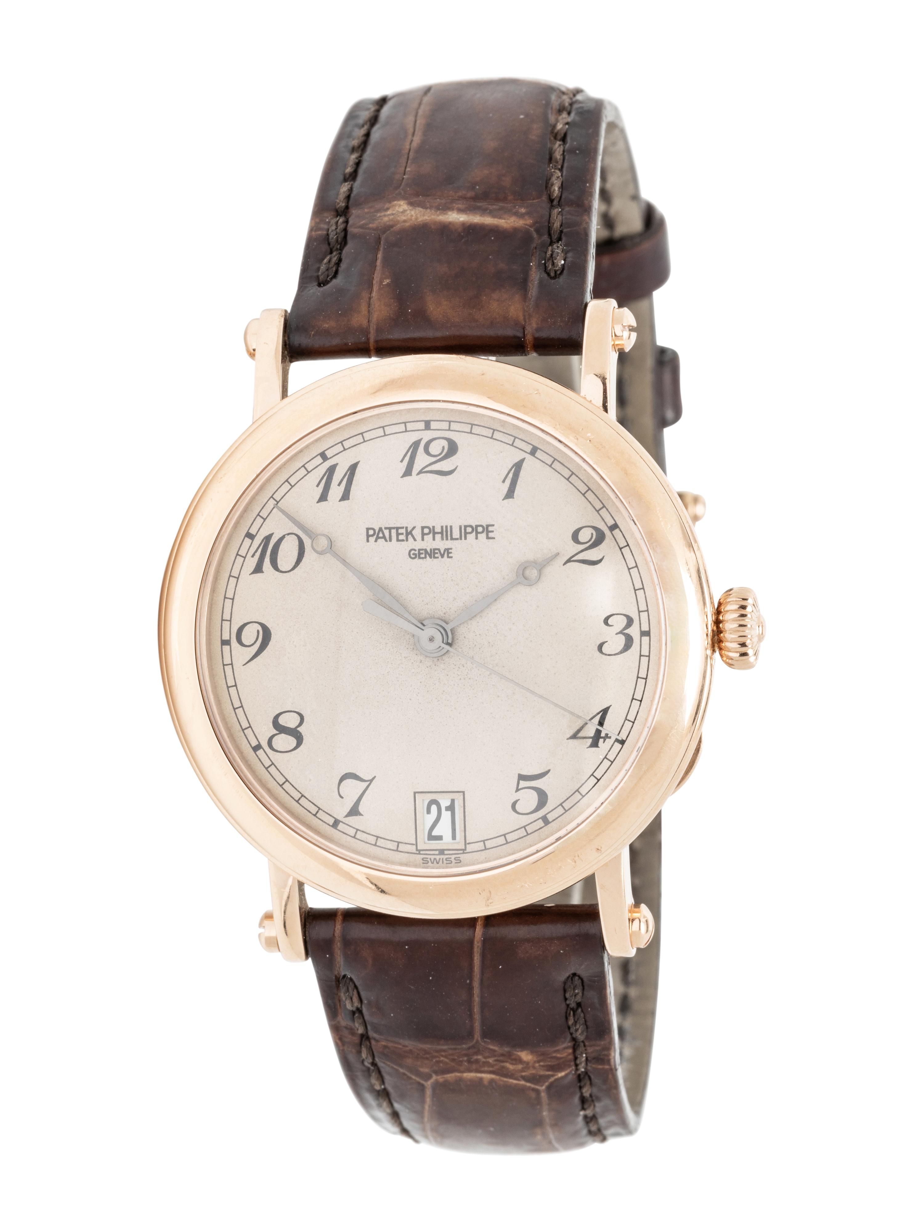 PATEK PHILIPPE, REF. 5053 18K YELLOW GOLD 'CALATRAVA' DATE WATCH WITH OFFICER'S CASEBACK