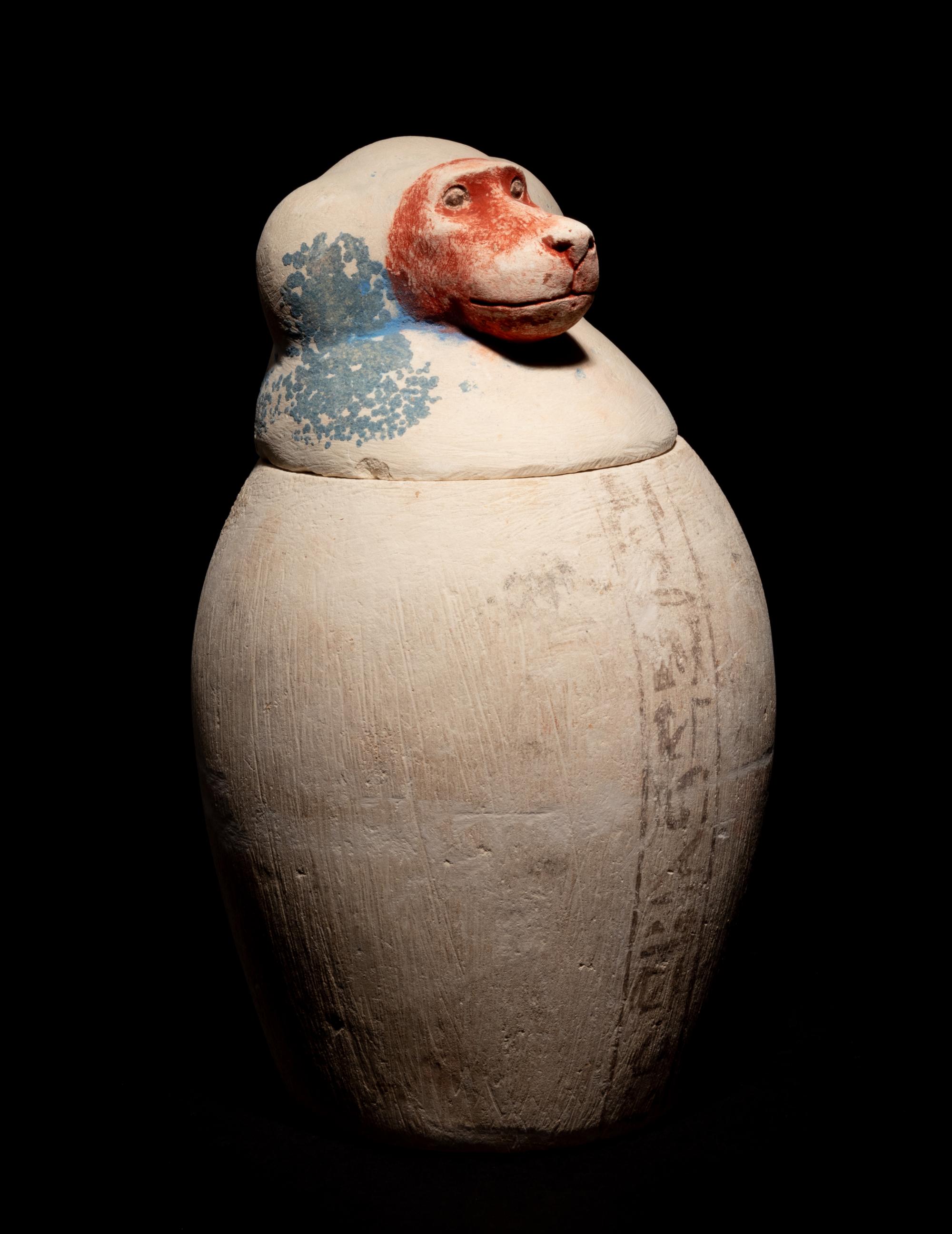 A Set of Four Egyptian Painted Limestone Canopic Jars of the Sons of Horus