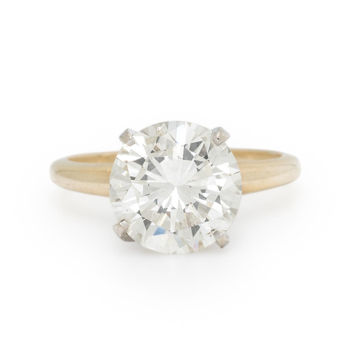 DIAMOND AND BICOLOR GOLD RING WITH JACKET
