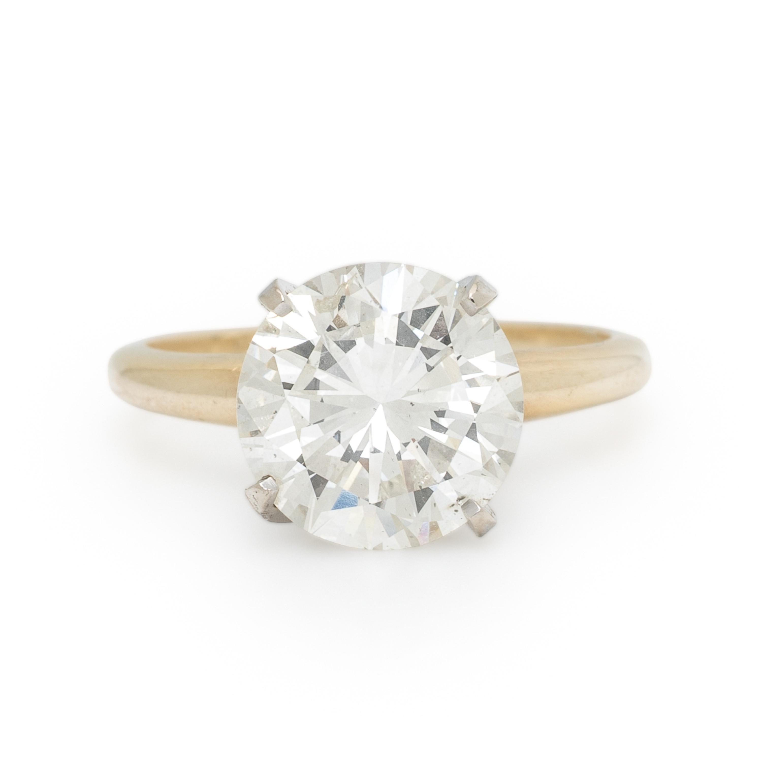 DIAMOND AND BICOLOR GOLD RING WITH JACKET