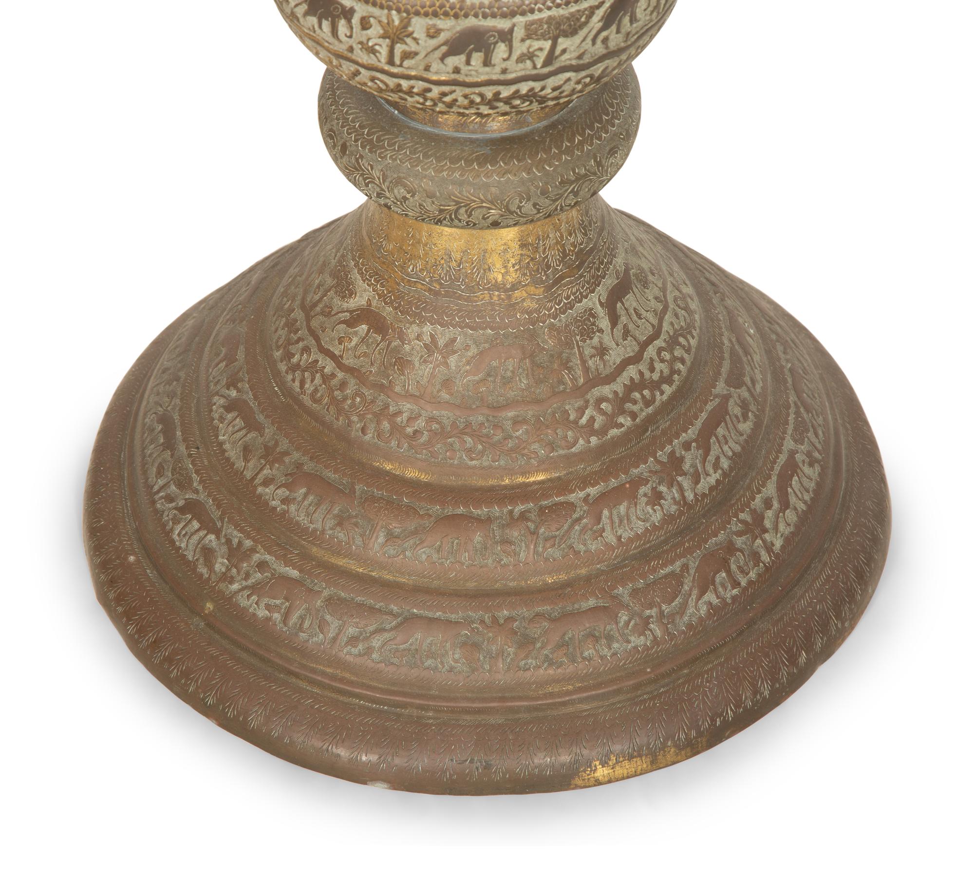 An Indian Pierced and Etched Brass Floor Lamp