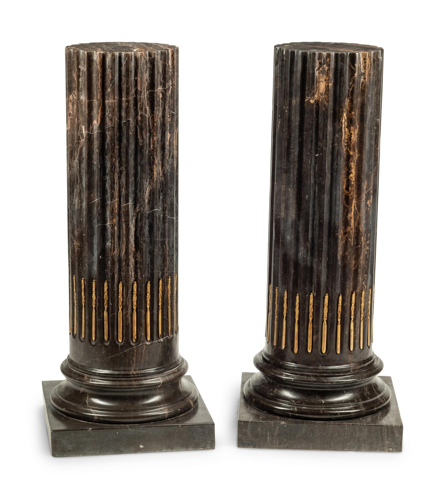 A Pair of Bronze Mounted Marble Pedestals