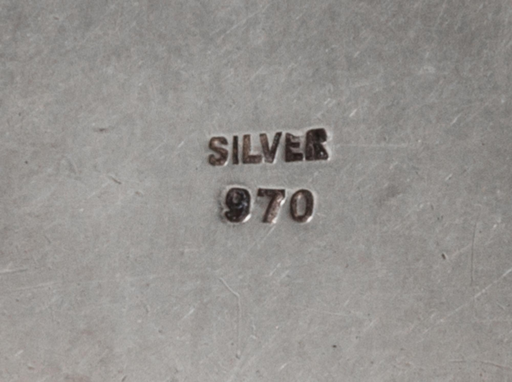 Four Silver Purse Articles, 20th Century, comprising a compact stamped sterling silver/37, a lipstick case stamped 950/silver, a pill b