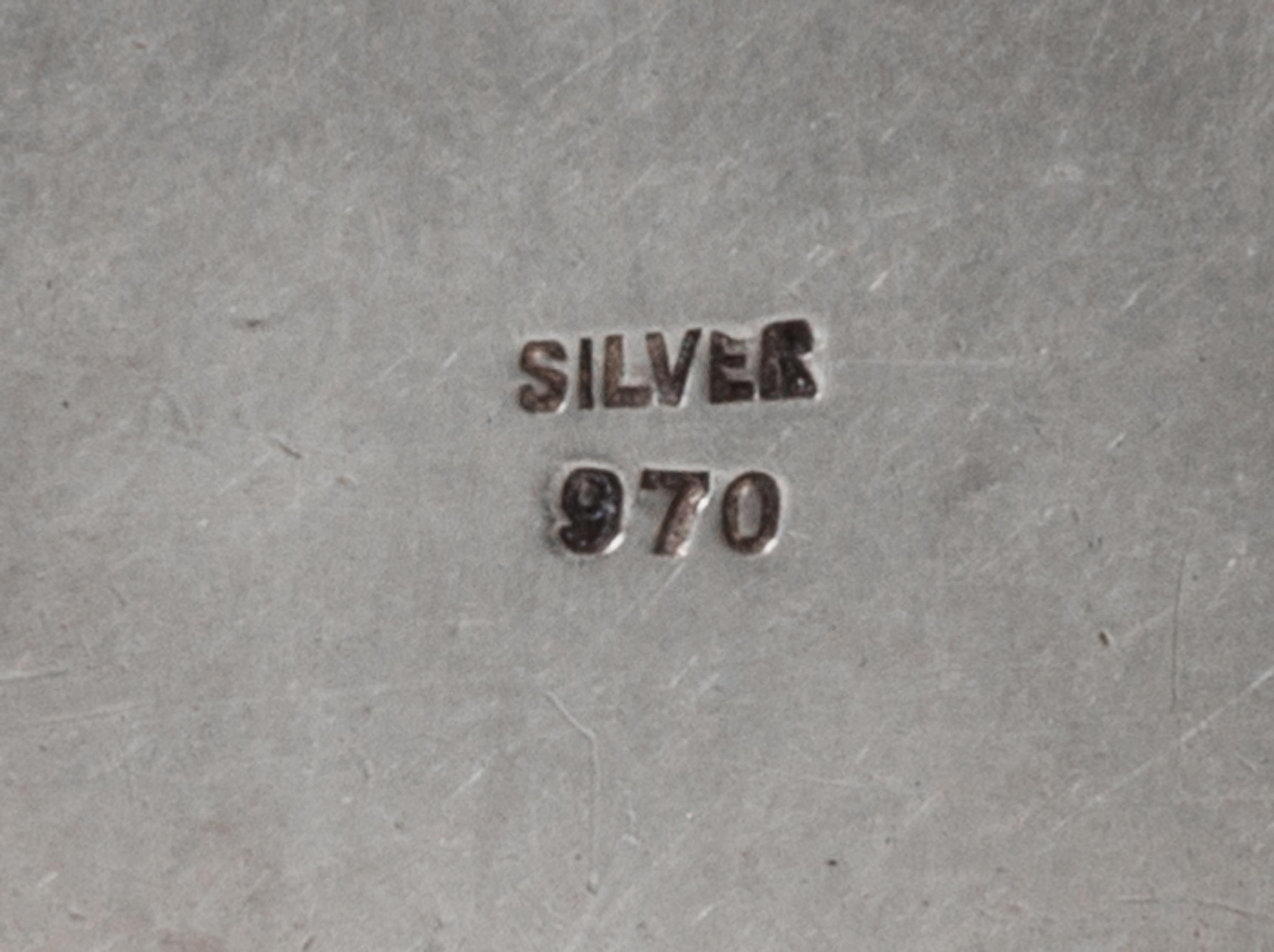 Four Silver Purse Articles, 20th Century, comprising a compact stamped sterling silver/37, a lipstick case stamped 950/silver, a pill b