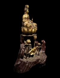 A Chinese Red and Gilt Lacquered Wood Figure of Guanyin