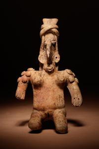 A Jalisco Terracotta Kneeling Figure