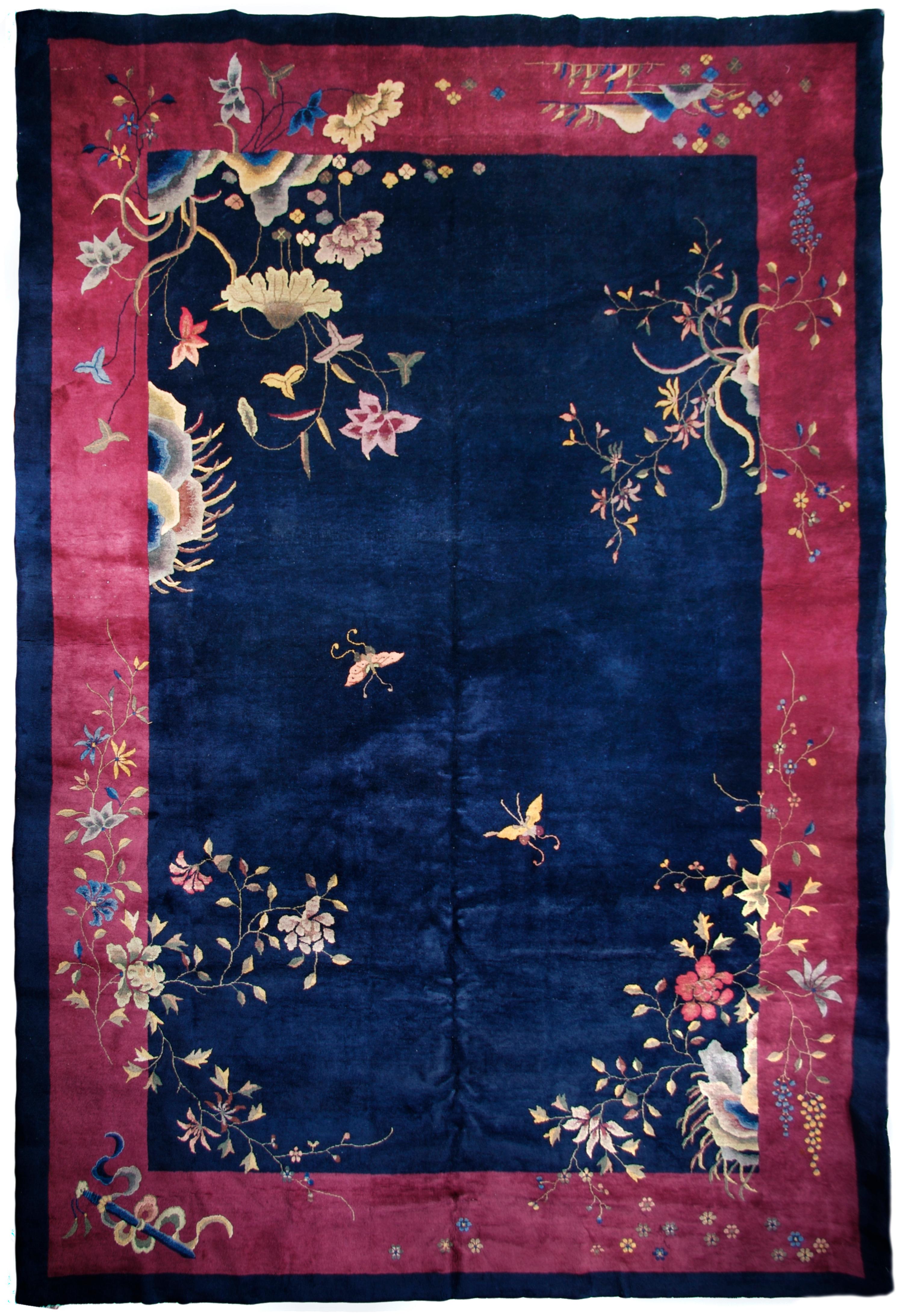 A Chinese Art Deco Rug. 10 feet x 14 feet.