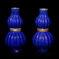 A Pair of Chinese Gilt Decorated Blue Glazed Porcelain Gourd Vases, 20th Century — 霽藍釉描金葫蘆式包袱瓶一對