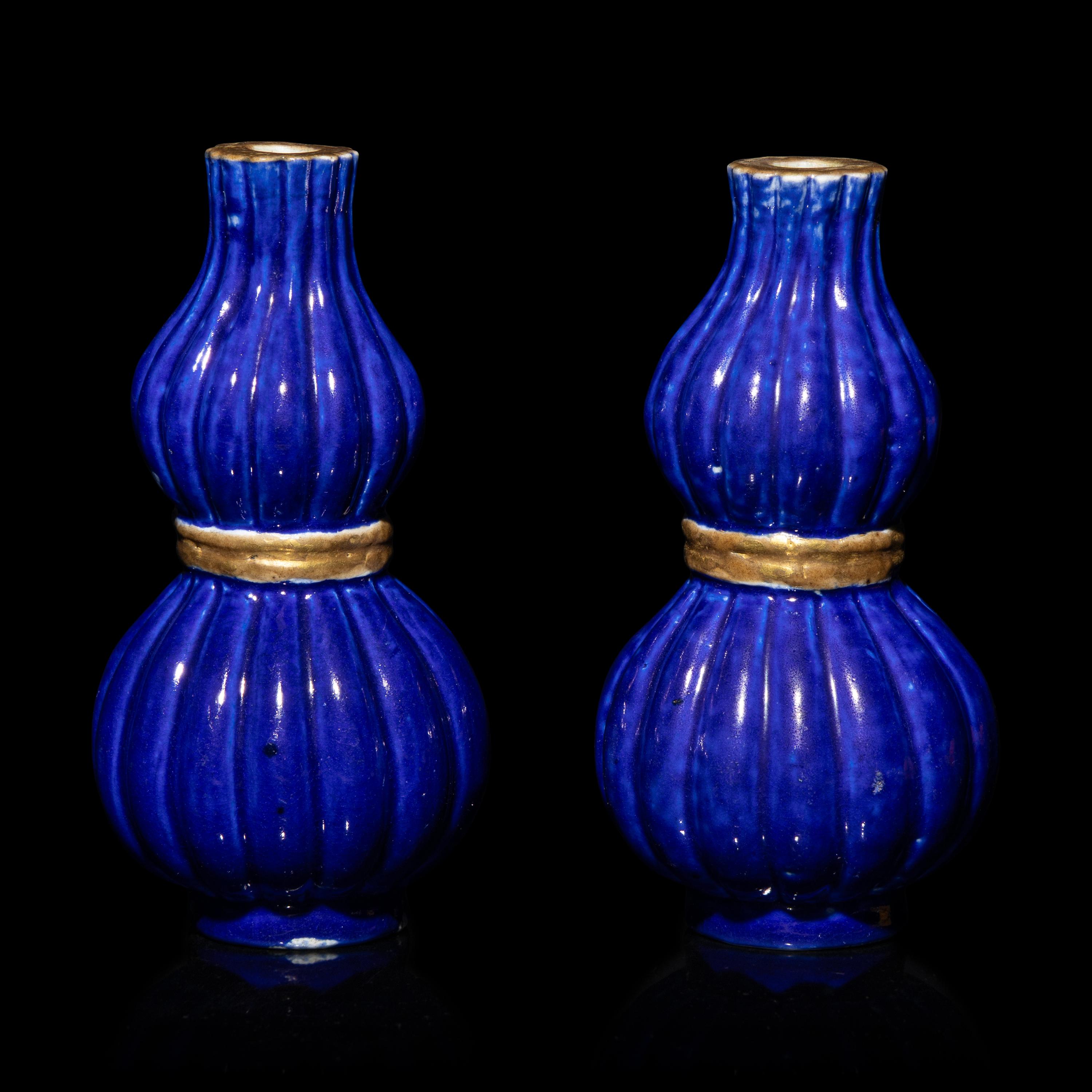 A Pair of Chinese Gilt Decorated Blue Glazed Porcelain Gourd Vases, 20th Century — 霽藍釉描金葫蘆式包袱瓶一對