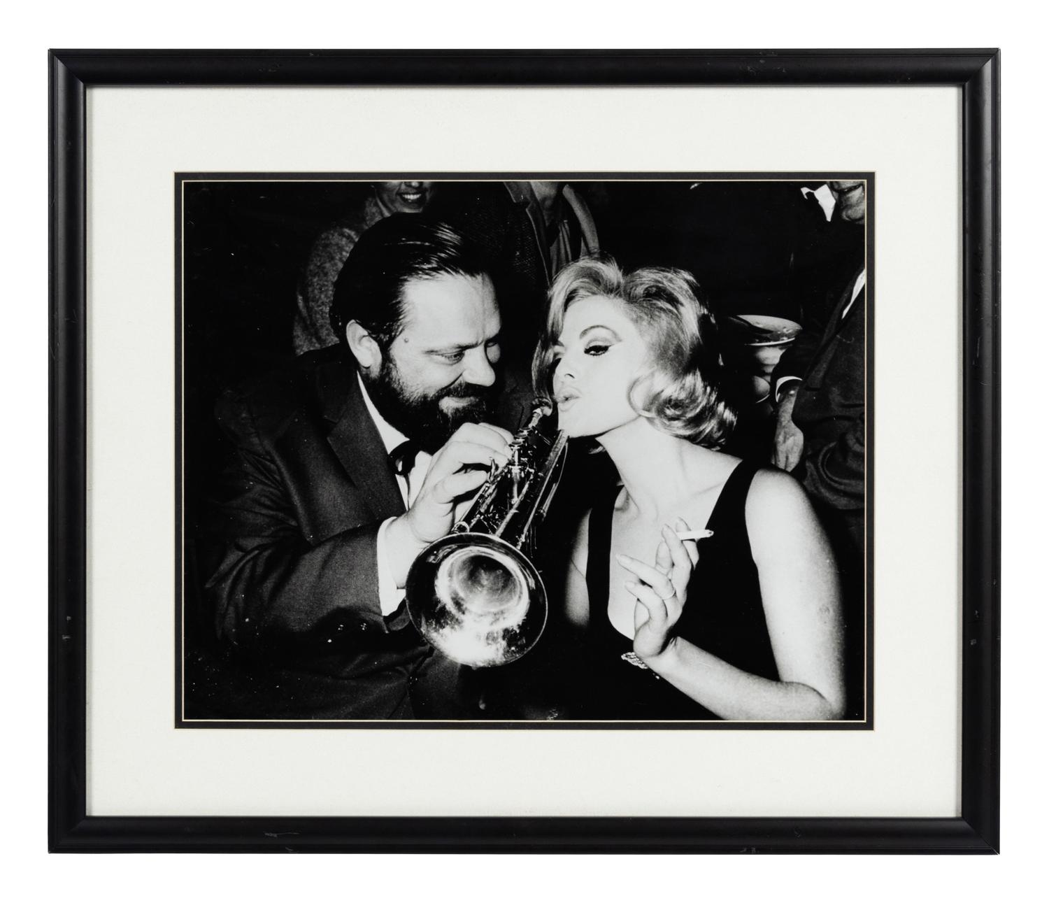 A Group of 20 Celebrity and Sports Personality Photographs Formerly Displayed at Mike Ditka’s Restaurant