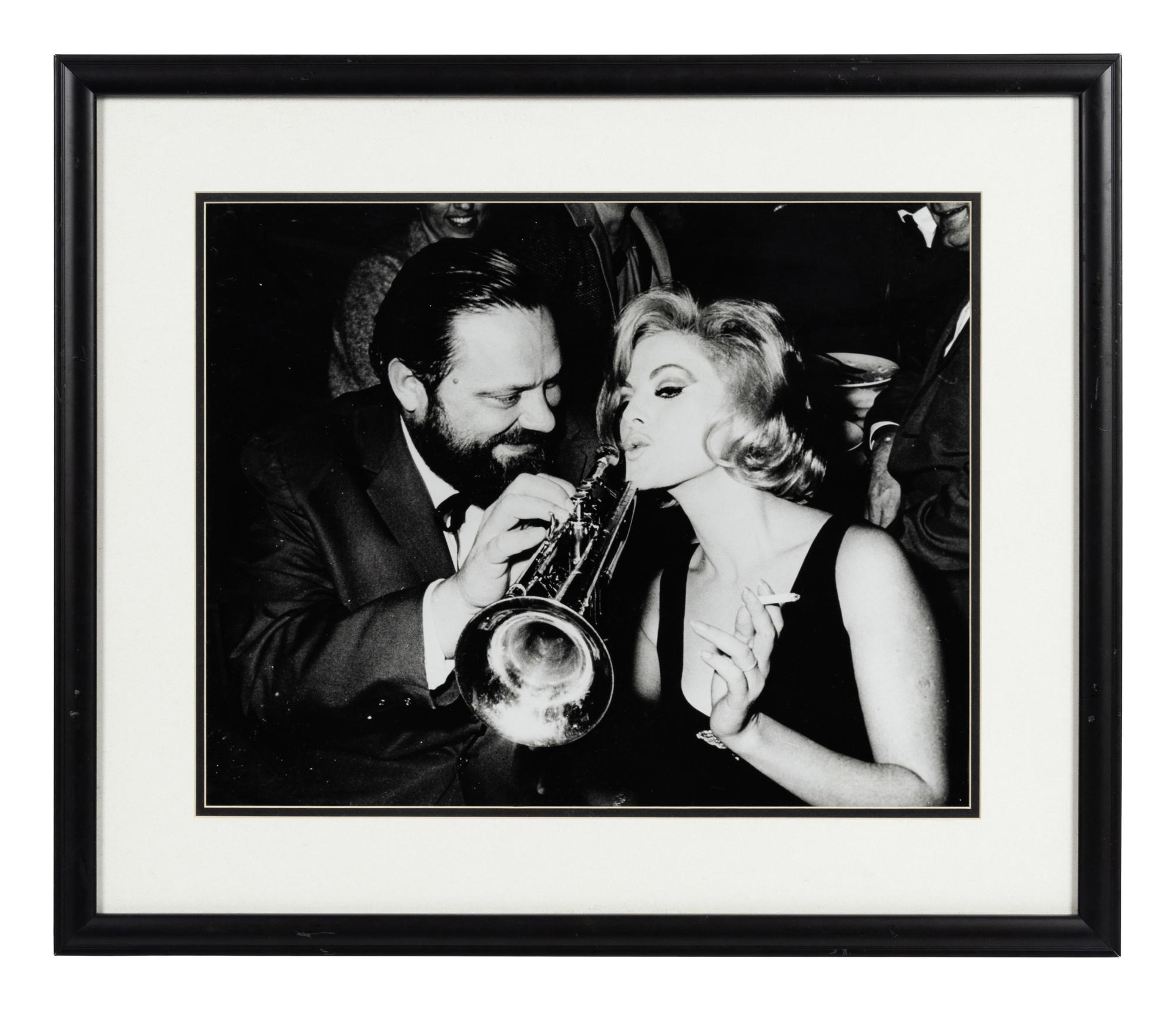 A Group of 20 Celebrity and Sports Personality Photographs Formerly Displayed at Mike Ditka’s Restaurant