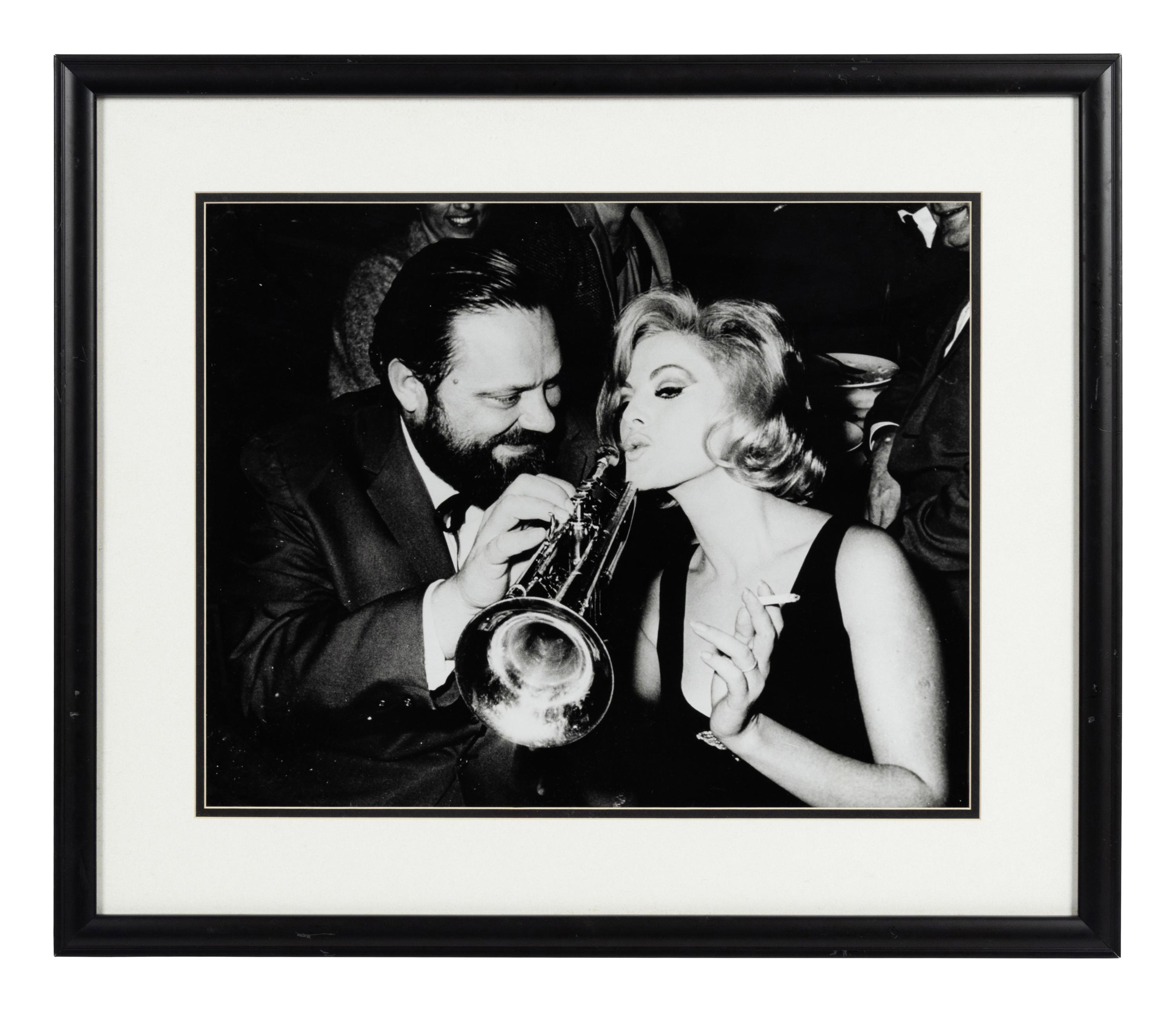 A Group of 20 Celebrity and Sports Personality Photographs Formerly Displayed at Mike Ditka’s Restaurant