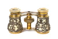 A Pair of French Silver Overlay Opera Glasses, Audemair, Width 3 7/8 inches.