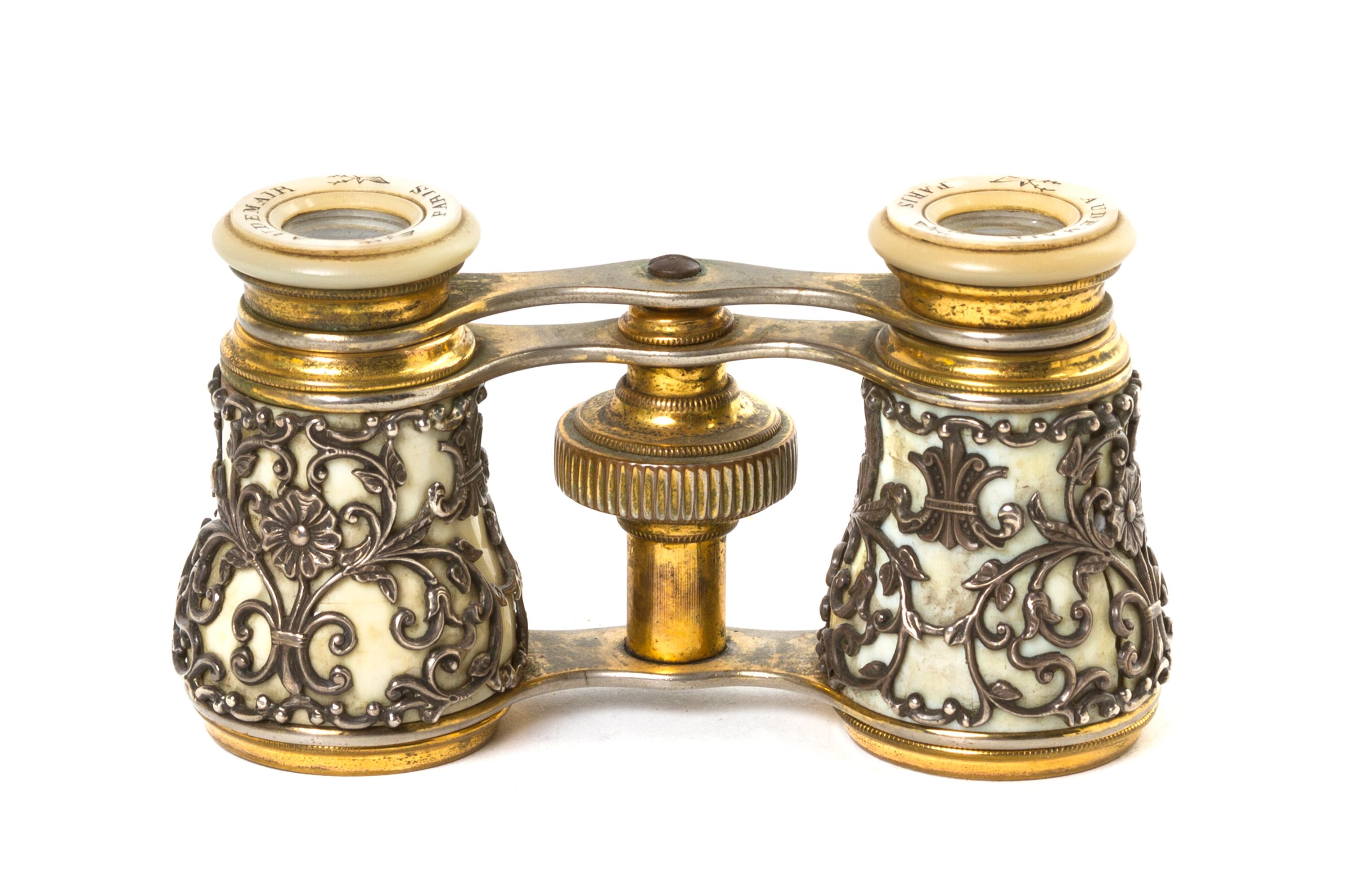 A Pair of French Silver Overlay Opera Glasses, Audemair, Width 3 7/8 inches.