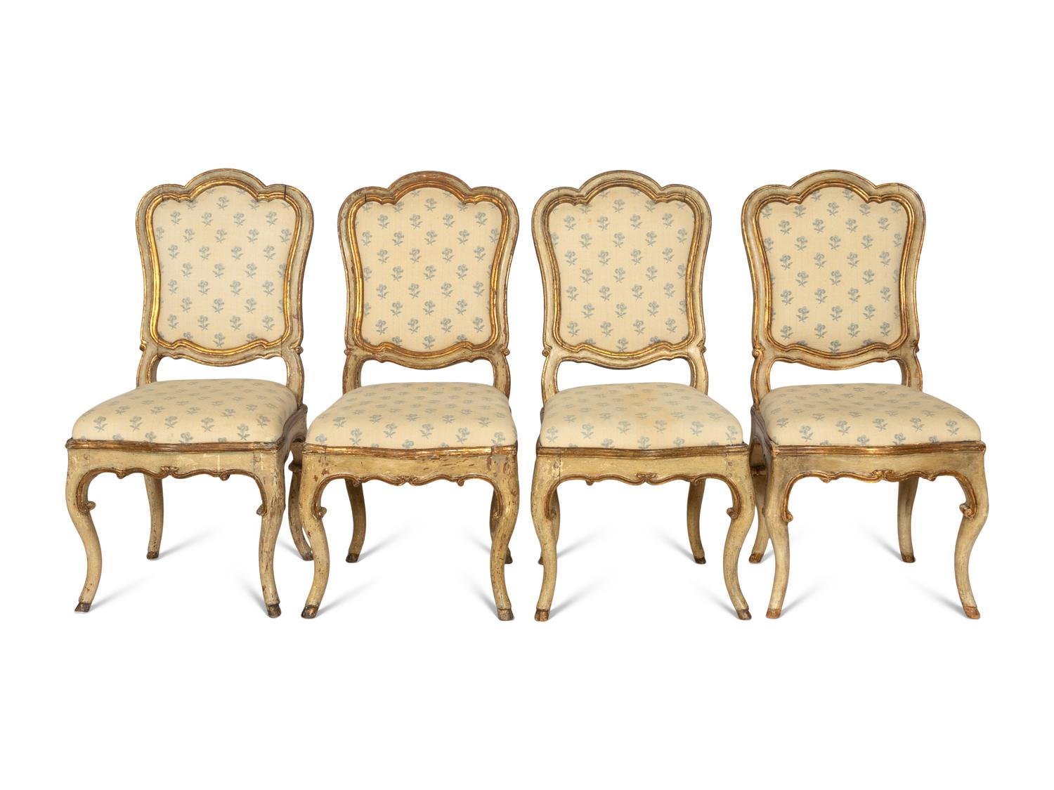A Set of Four Venetian Rococo Cream-Painted and Parcel Gilt Dining Chairs