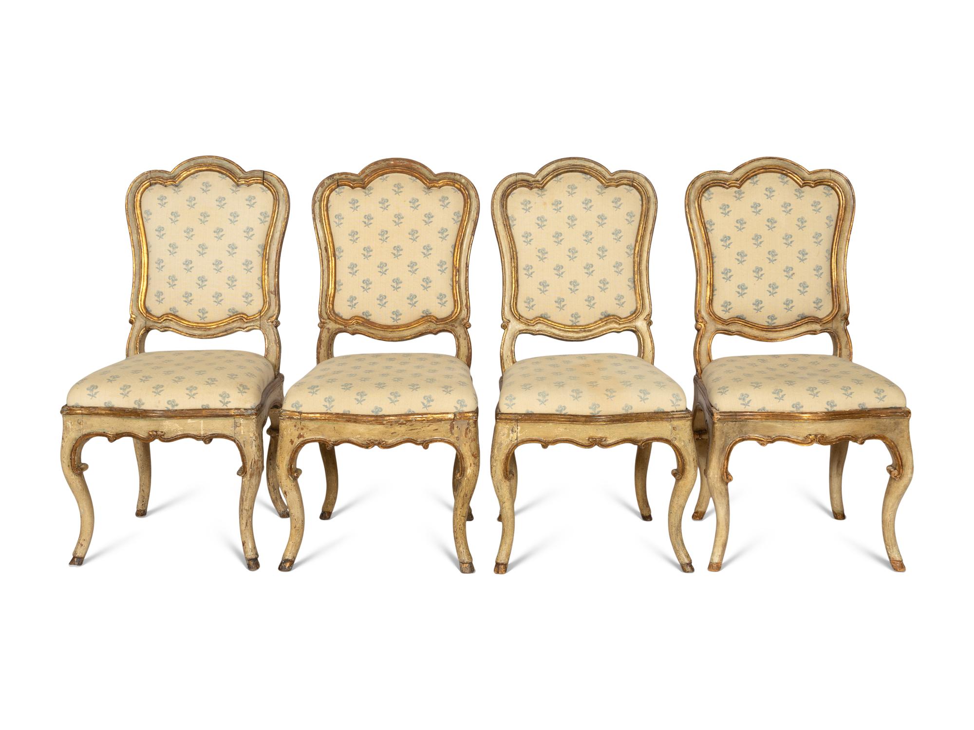 A Set of Four Venetian Rococo Cream-Painted and Parcel Gilt Dining Chairs