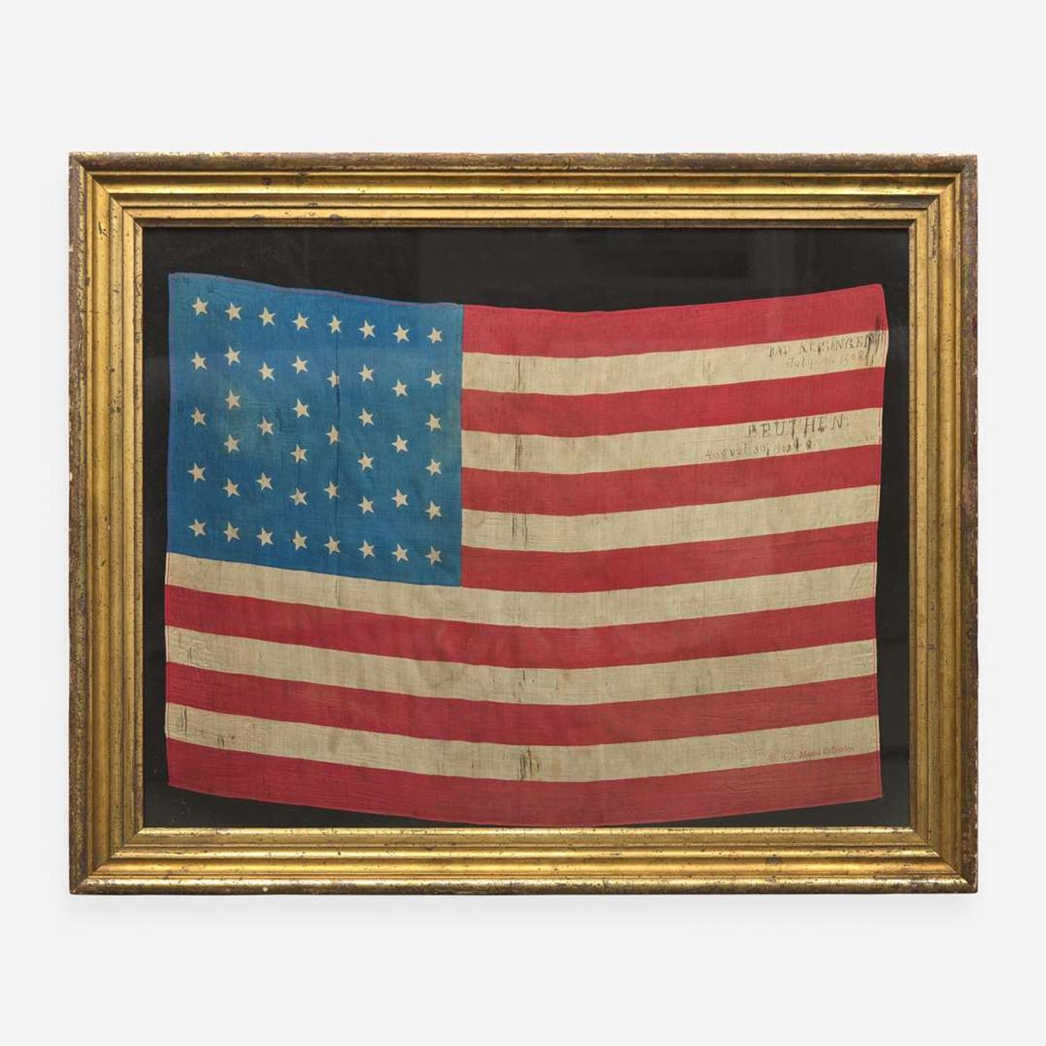 A 44-Star printed silk American National Parade Flag commemorating Wyoming statehood Dated, "1908"