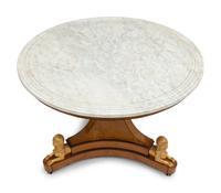 A Charles X Amboyna, Amaranth and Parcel Gilt Marble-Top Center Table