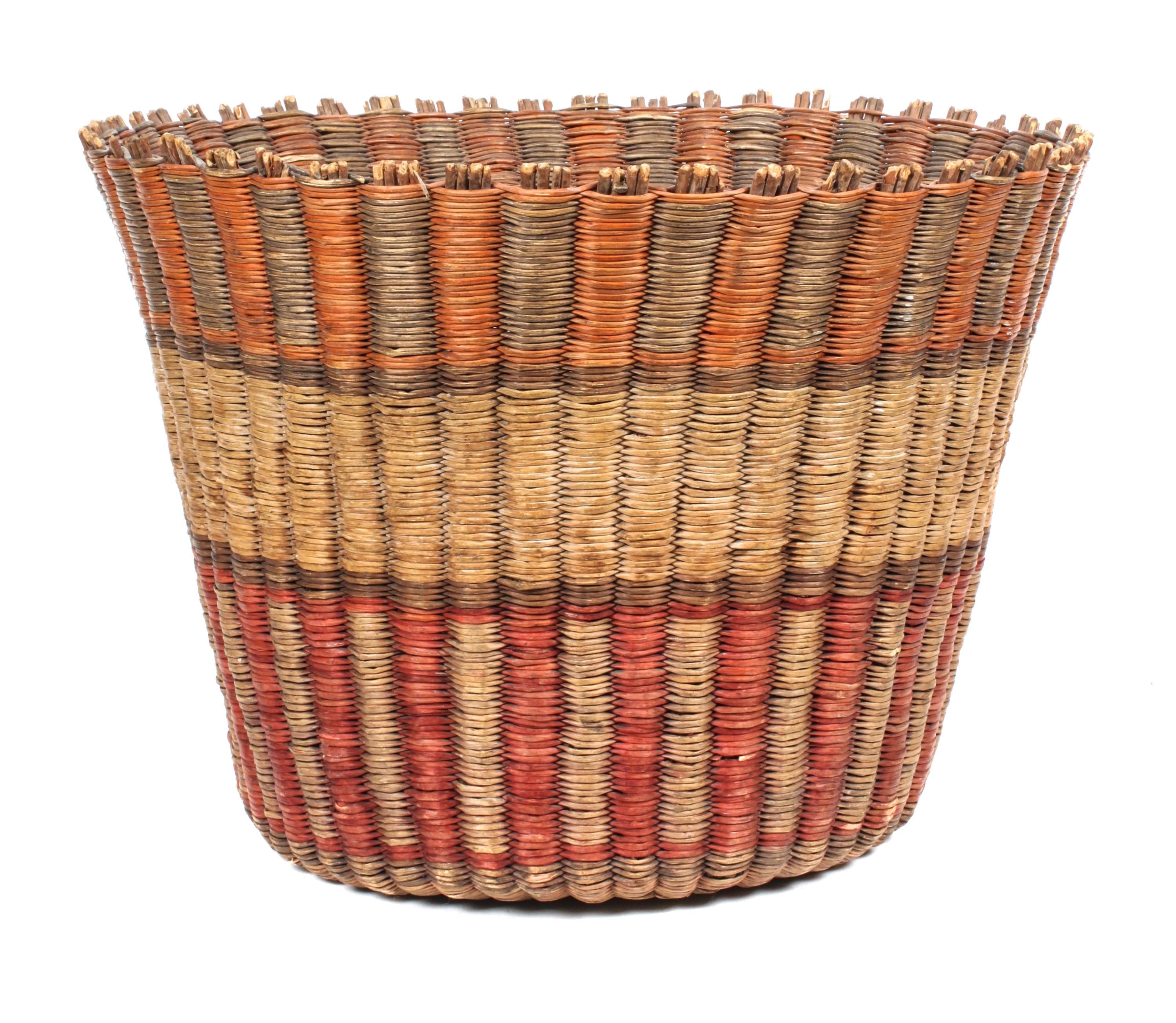 A Group of Three Southwestern Baskets Height of first 10 x diameter 14 inches.