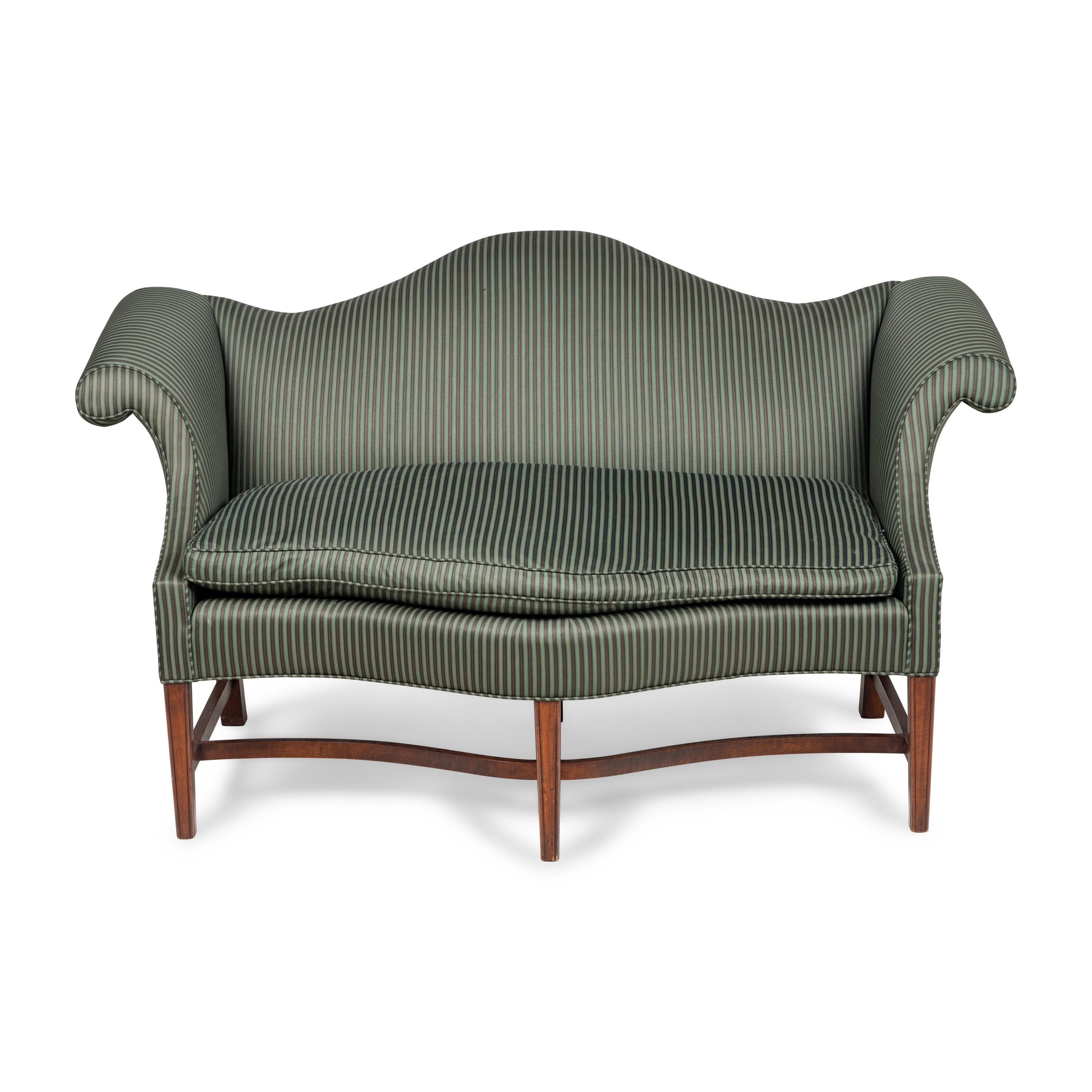 A George III Style Mahogany Camelback Serpentine Sofa