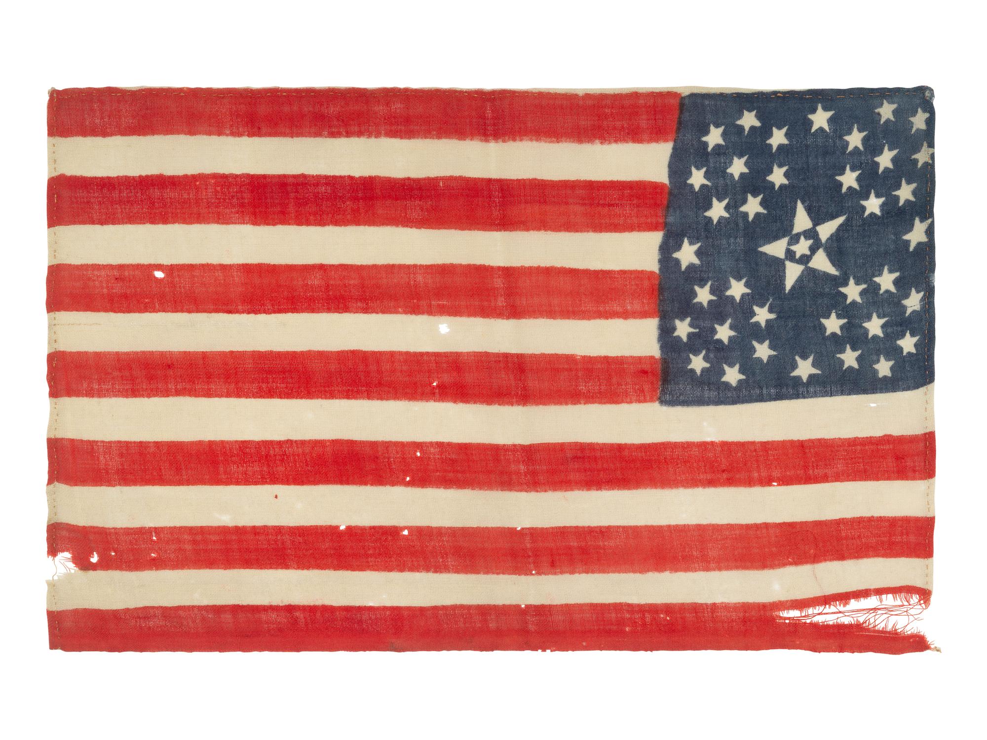 [FLAGS]. 38-star American parade flag with floral star pattern. Ca 1876.