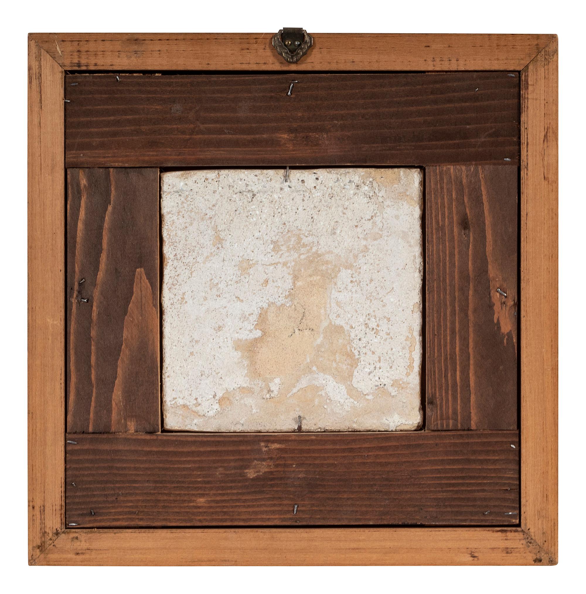 A Set of Five Framed Puce Delft Tiles