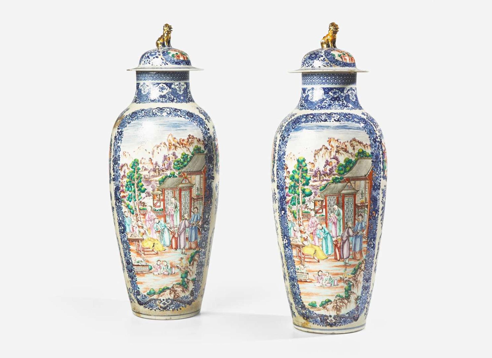 A pair of large and finely painted Chinese Export porcelain Famille Rose covered vases, 18th century