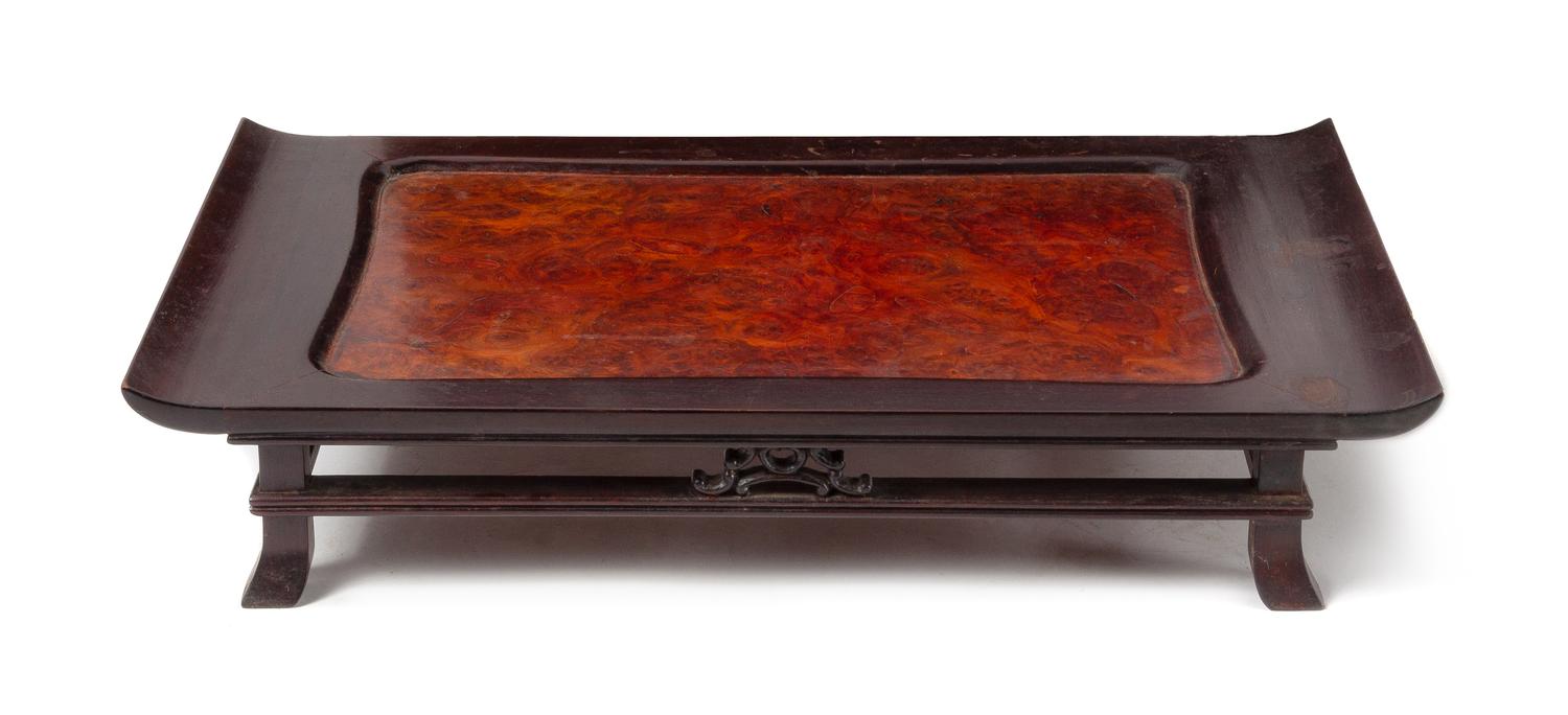 A Burlwood Inset Hardwood Stand Height 4 x width 20 1/4 x depth 11 1/8 inches.