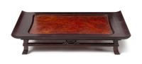 A Burlwood Inset Hardwood Stand Height 4 x width 20 1/4 x depth 11 1/8 inches.