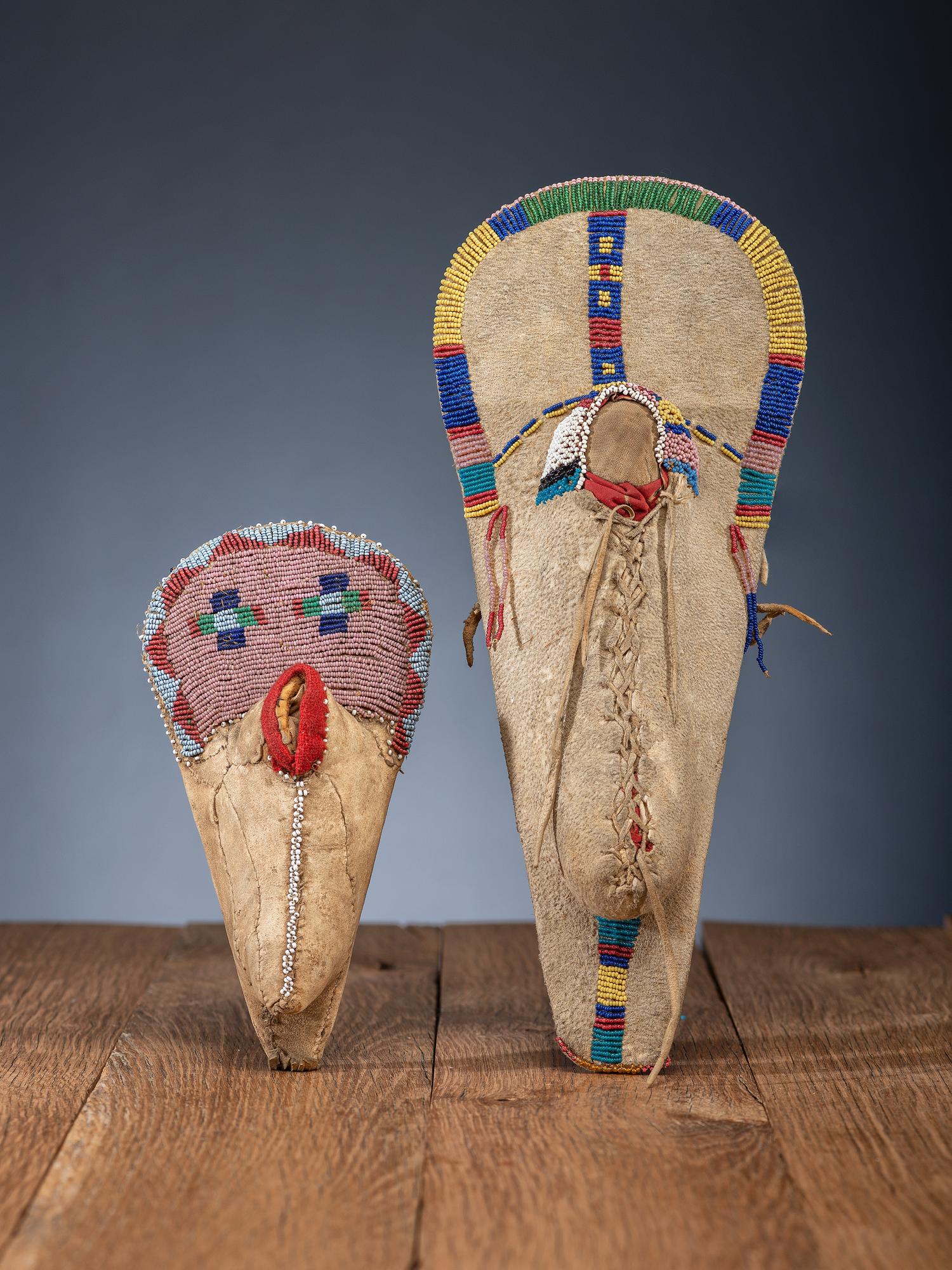 Bannock and Ute Beaded Hide Toy Cradles