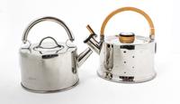 Two Stainless Steel Tea Kettles Height of tallest 9 1/4 inches.