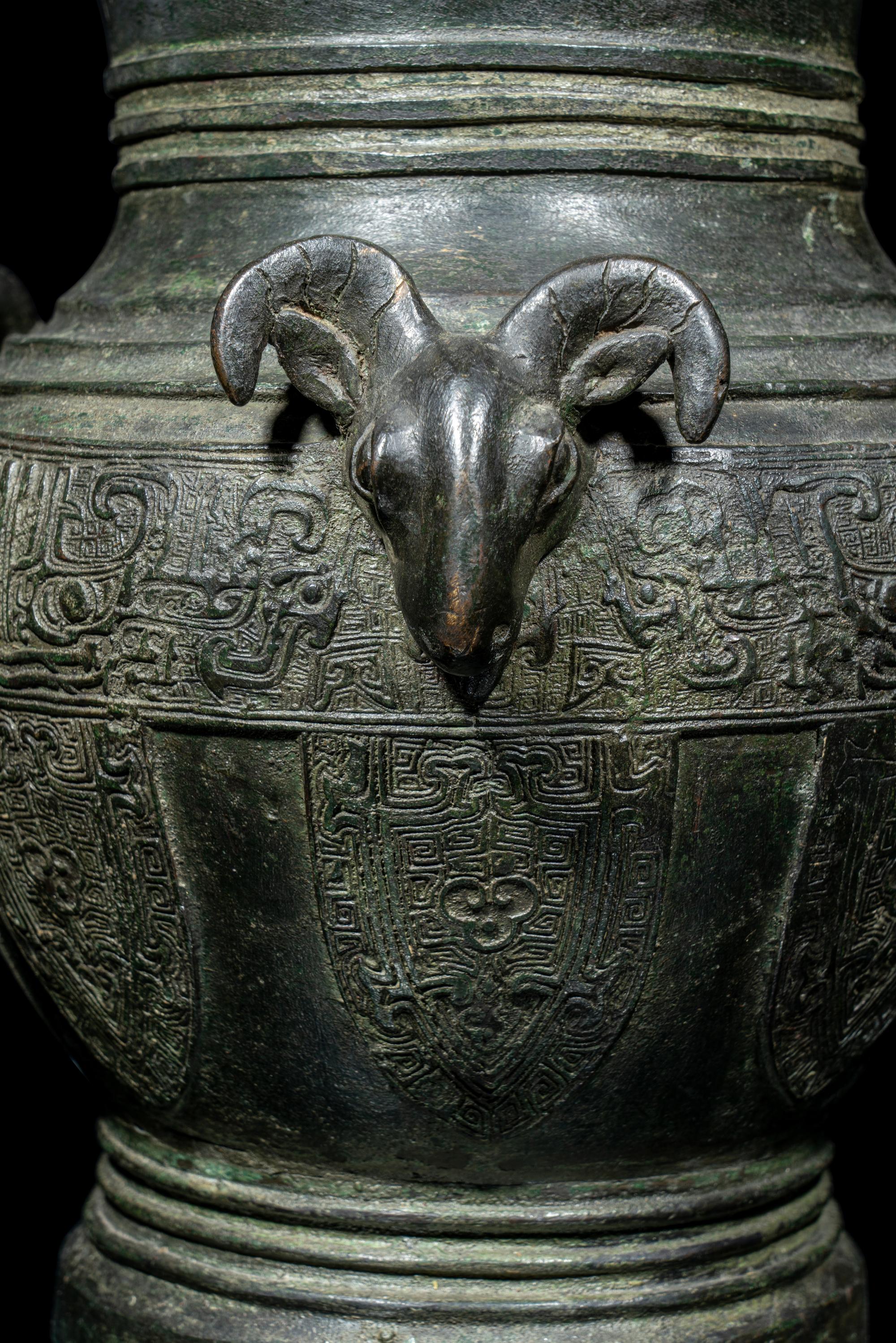 A Chinese Archaistic Bronze 'Three Rams' Hu Vessel