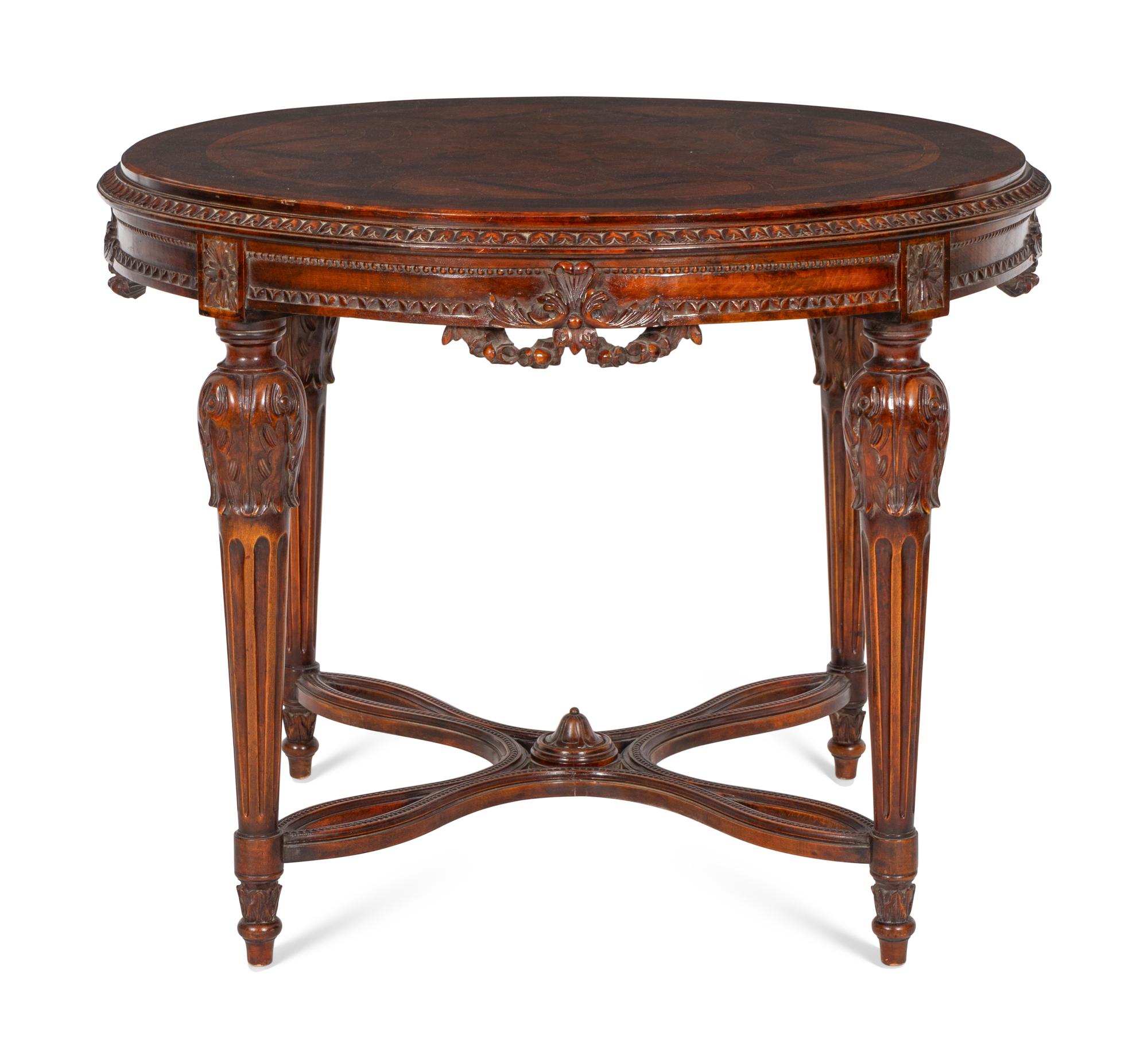 A Louis XVI Style Marquetry and Mahogany Center Table