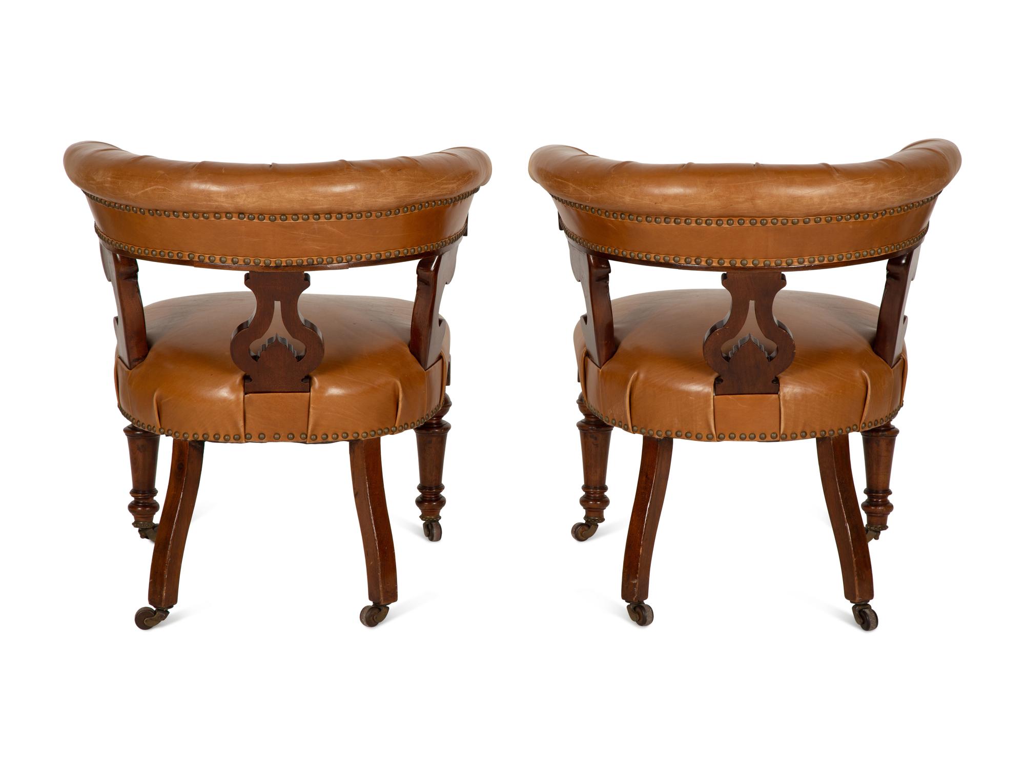 A Pair of William IV Style Leather-Upholstered Mahogany Armchairs