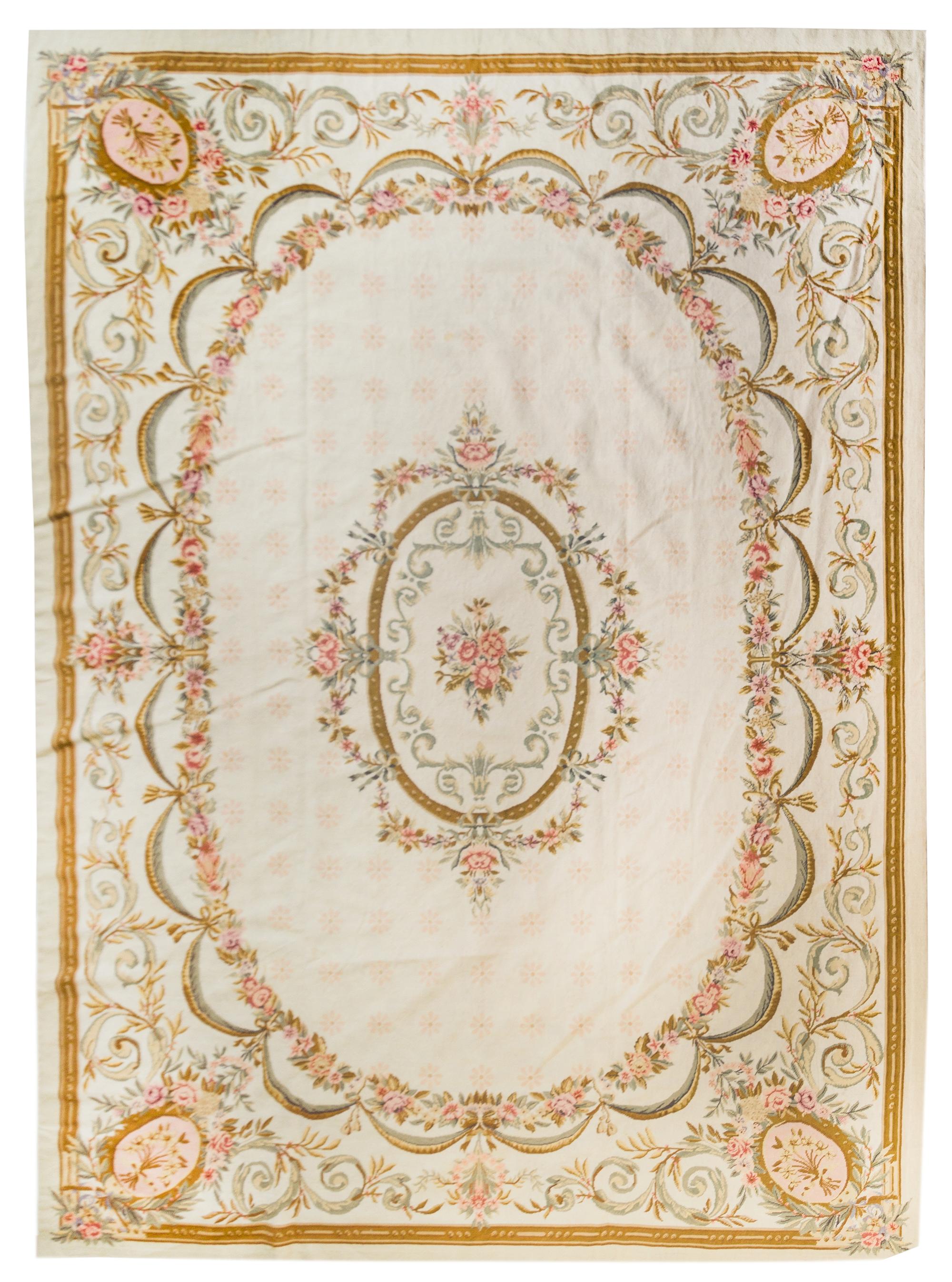 A Needlepoint Wool Rug 11 feet 1 inch x 8 feet 7 inches. — 20TH CENTURY