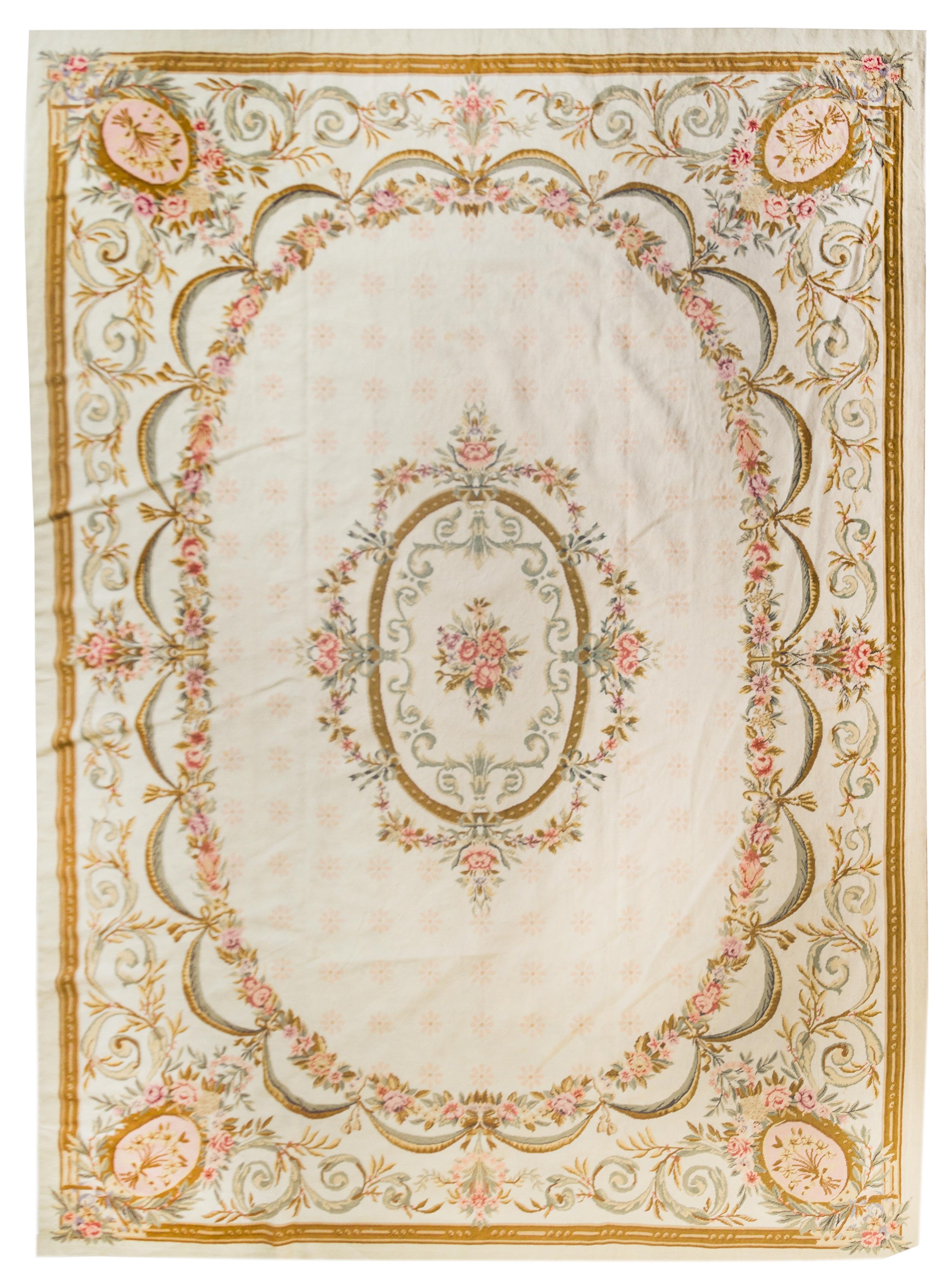 A Needlepoint Wool Rug 11 feet 1 inch x 8 feet 7 inches. — 20TH CENTURY