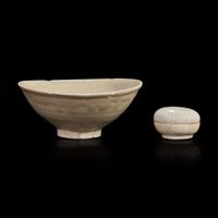 A Chinese small crackle-glaze circular box and a Chinese incised bowl Song dynasty