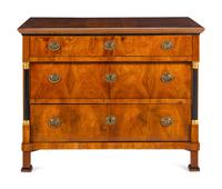 A Biedermeier Parcel Ebonized Walnut Commode