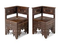 A Pair of Syrian Mother-of-Pearl Inlaid Carved Walnut Corner Chairs