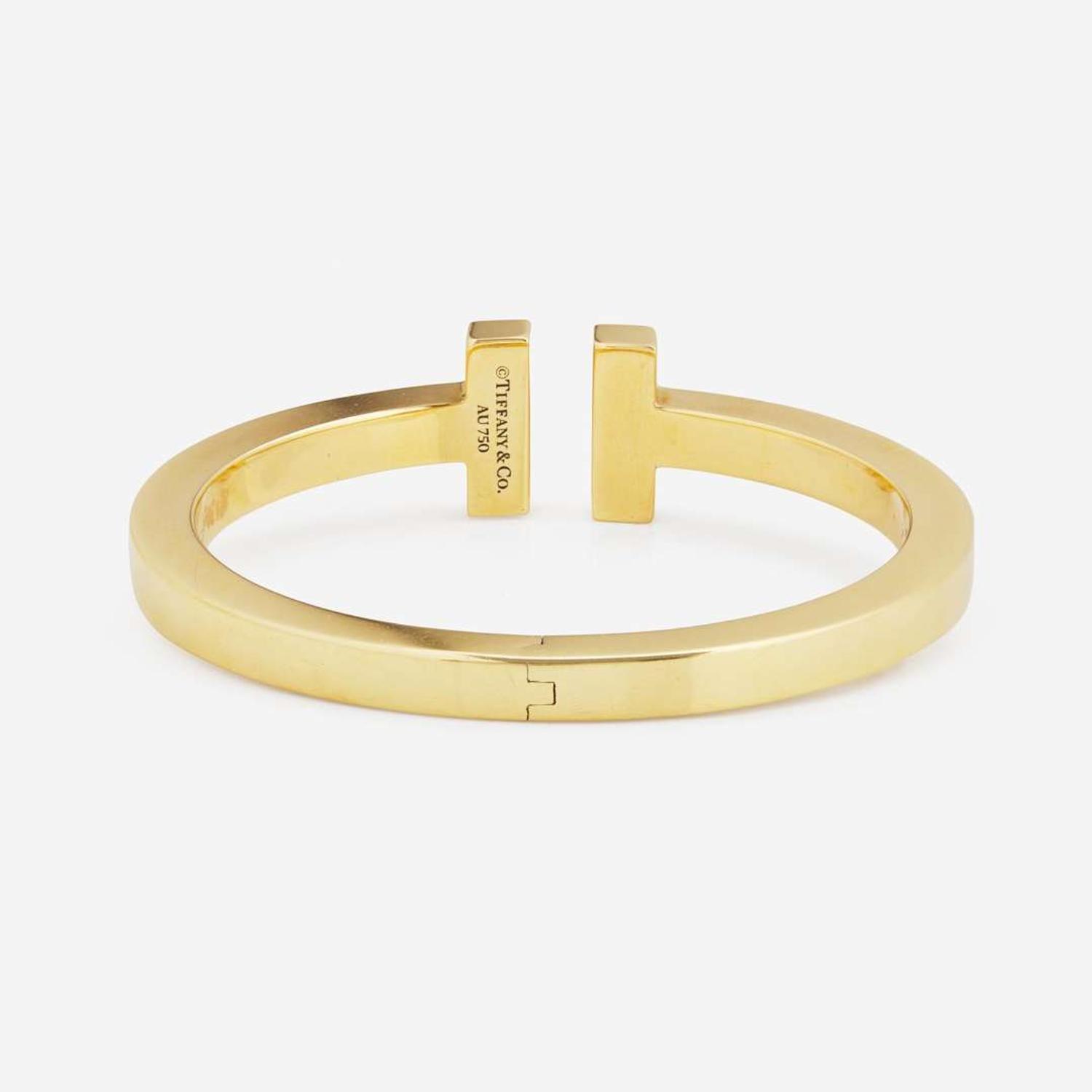 An 18K Yellow Gold " T" Bracelet by Tiffany & Co.