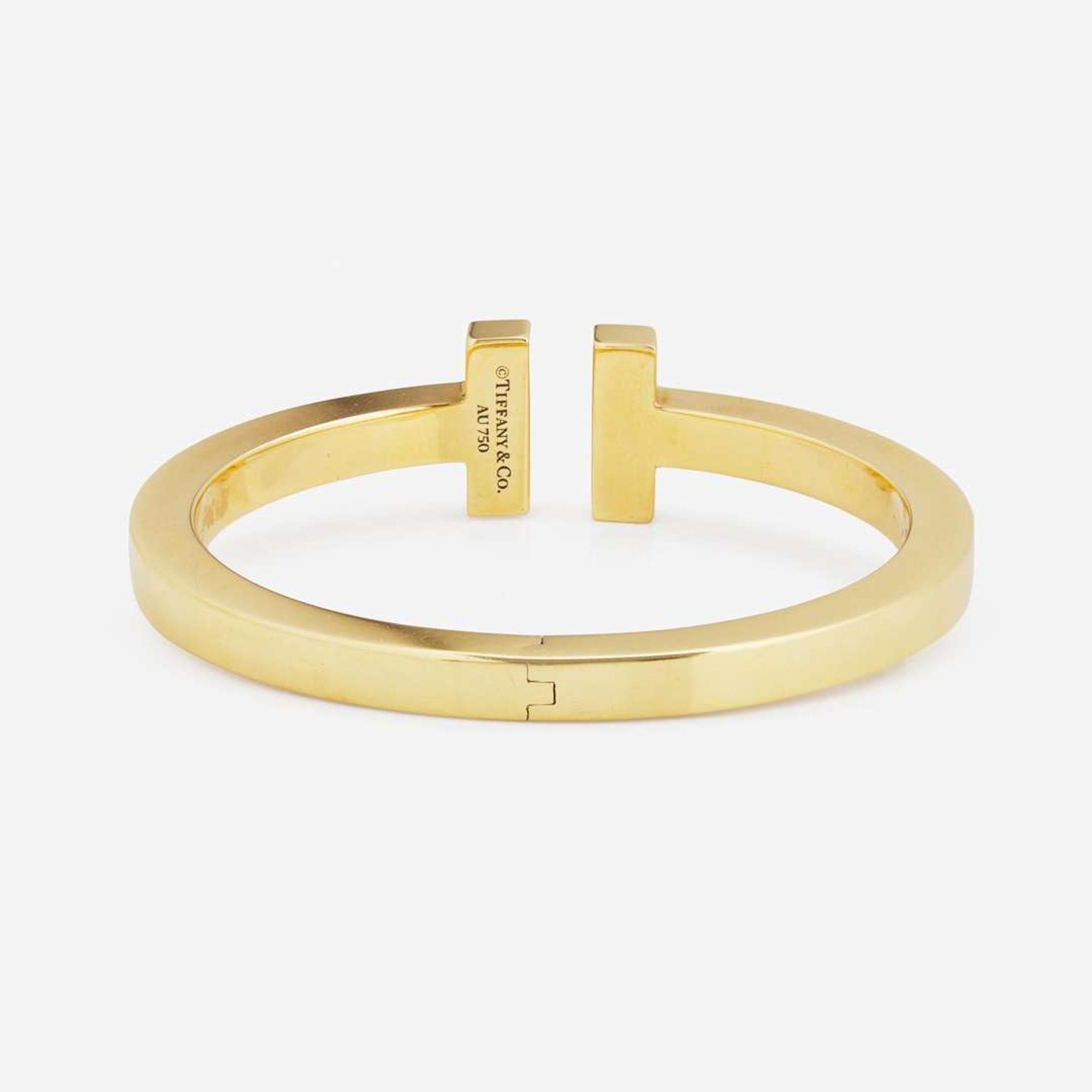 An 18K Yellow Gold " T" Bracelet by Tiffany & Co.