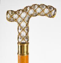 A Russian Gilt Metal and Cut Glass Mounted Cane Length 33 1/4 inches. — WITH SPURIOUS FABERGE MARKS, 20TH CENTURY