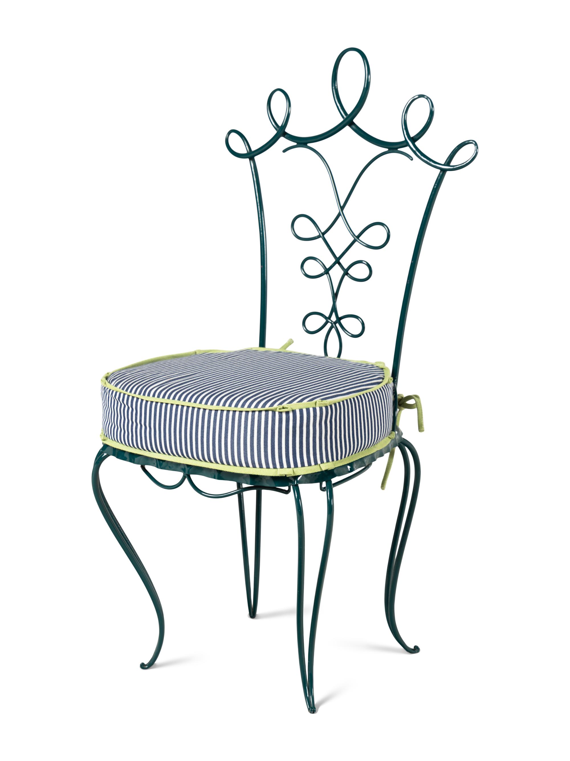 A Painted Iron Glass-Top Table and Chairs in the Style of Rene Prou